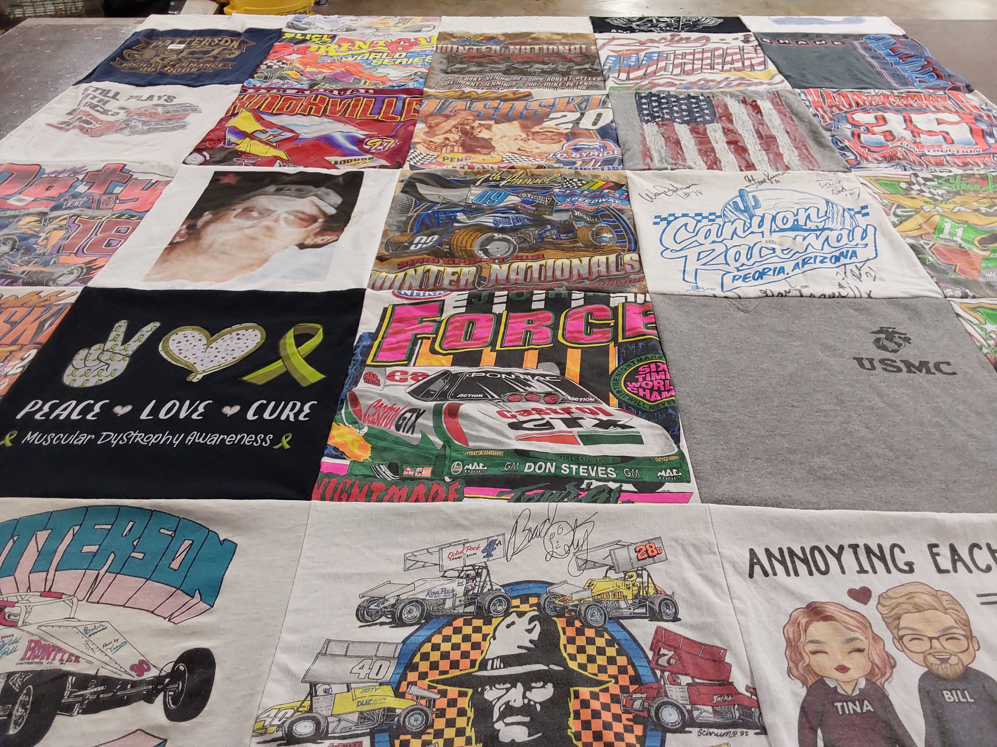 T-shirt quilt with motorsports, awareness causes themes by Tina from OK