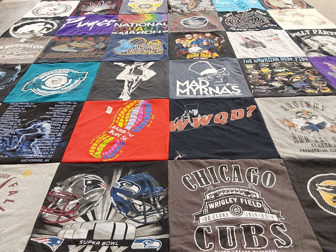 T-shirt quilt featuring new england patriots, seattle seahawks by Heather from AK