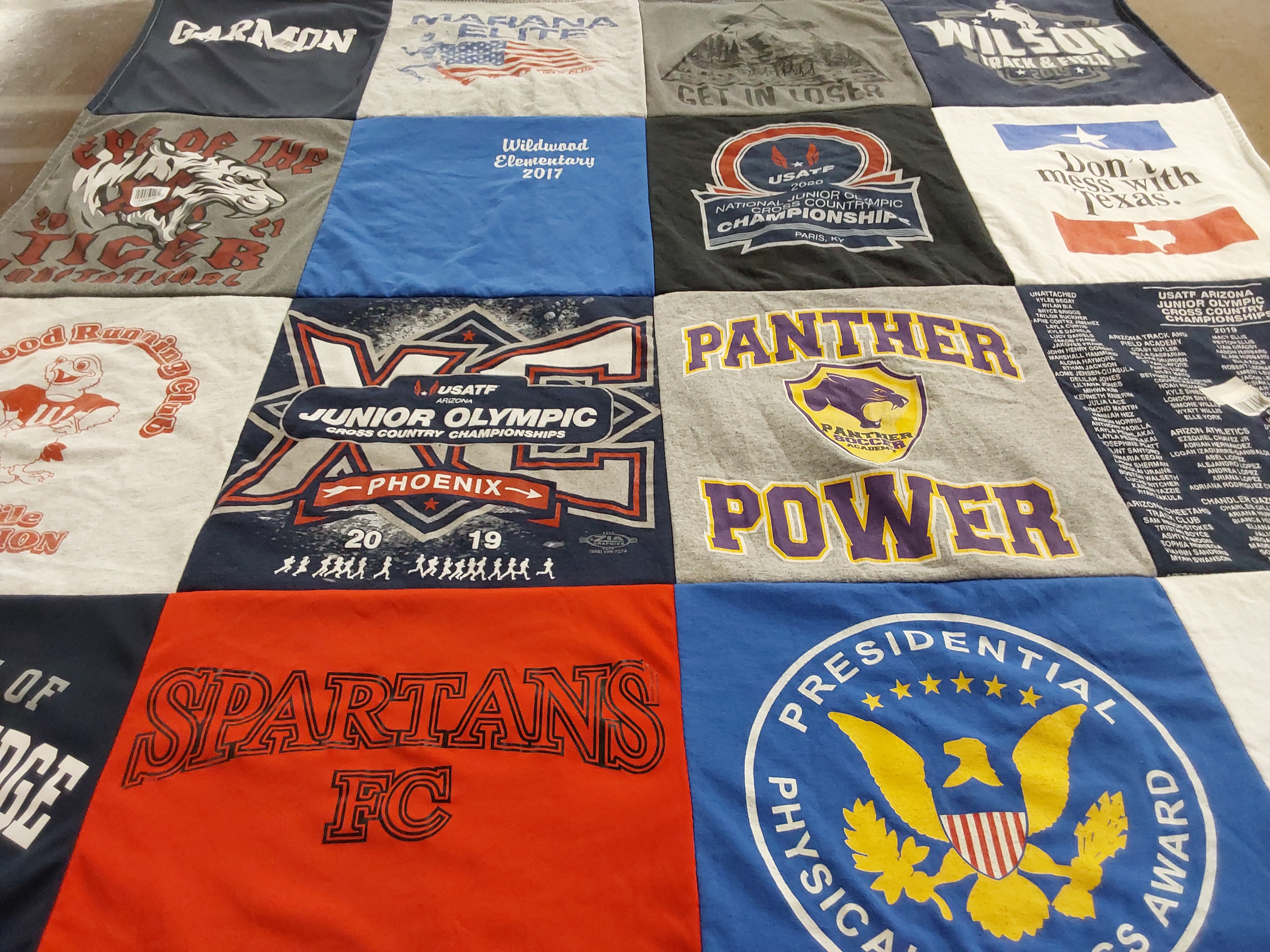 T-shirt quilt featuring spartan football club, panther athletics by Guadalupe from AZ