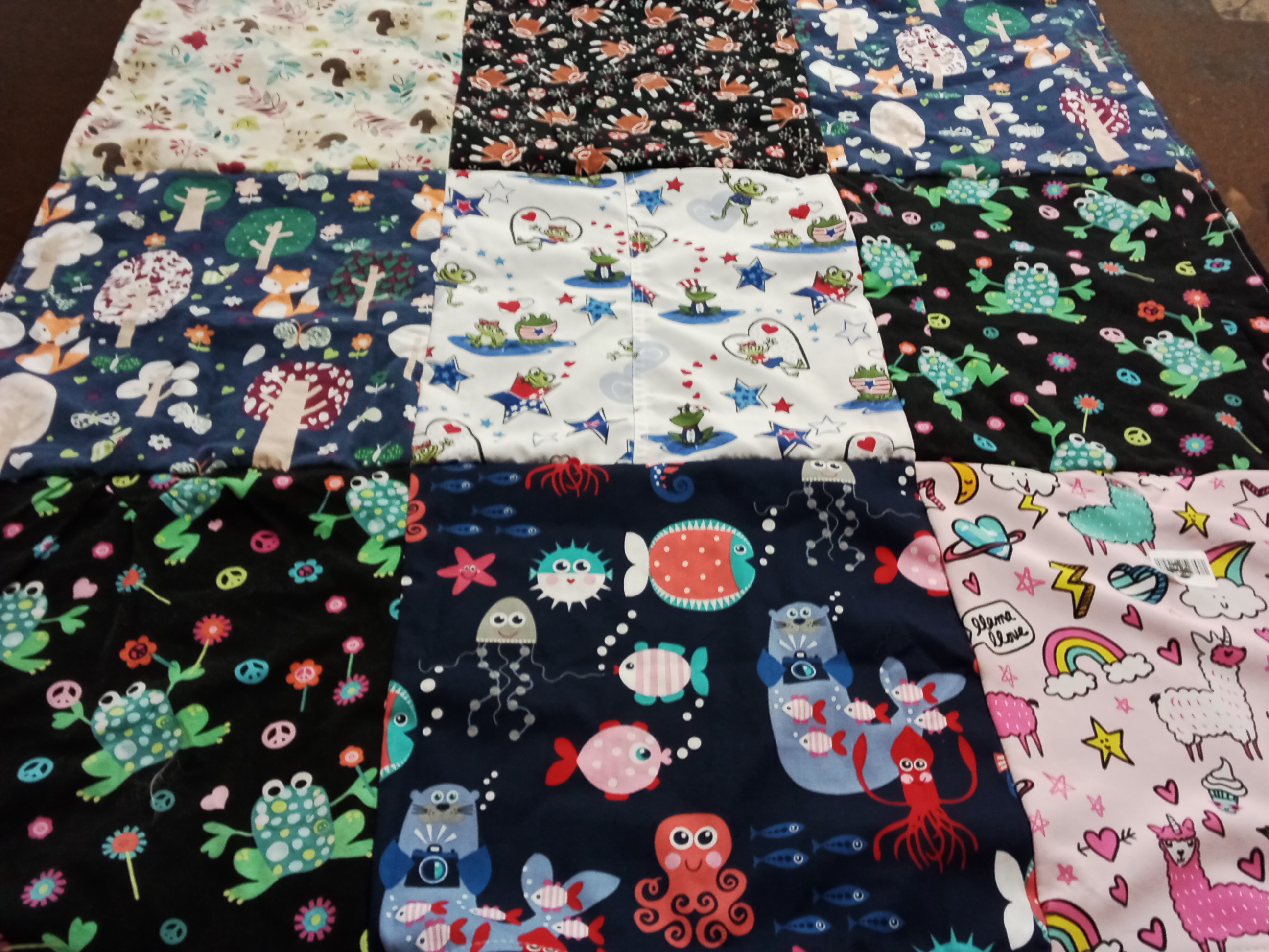 T-shirt quilt with nature, ocean themes by Marie from CA
