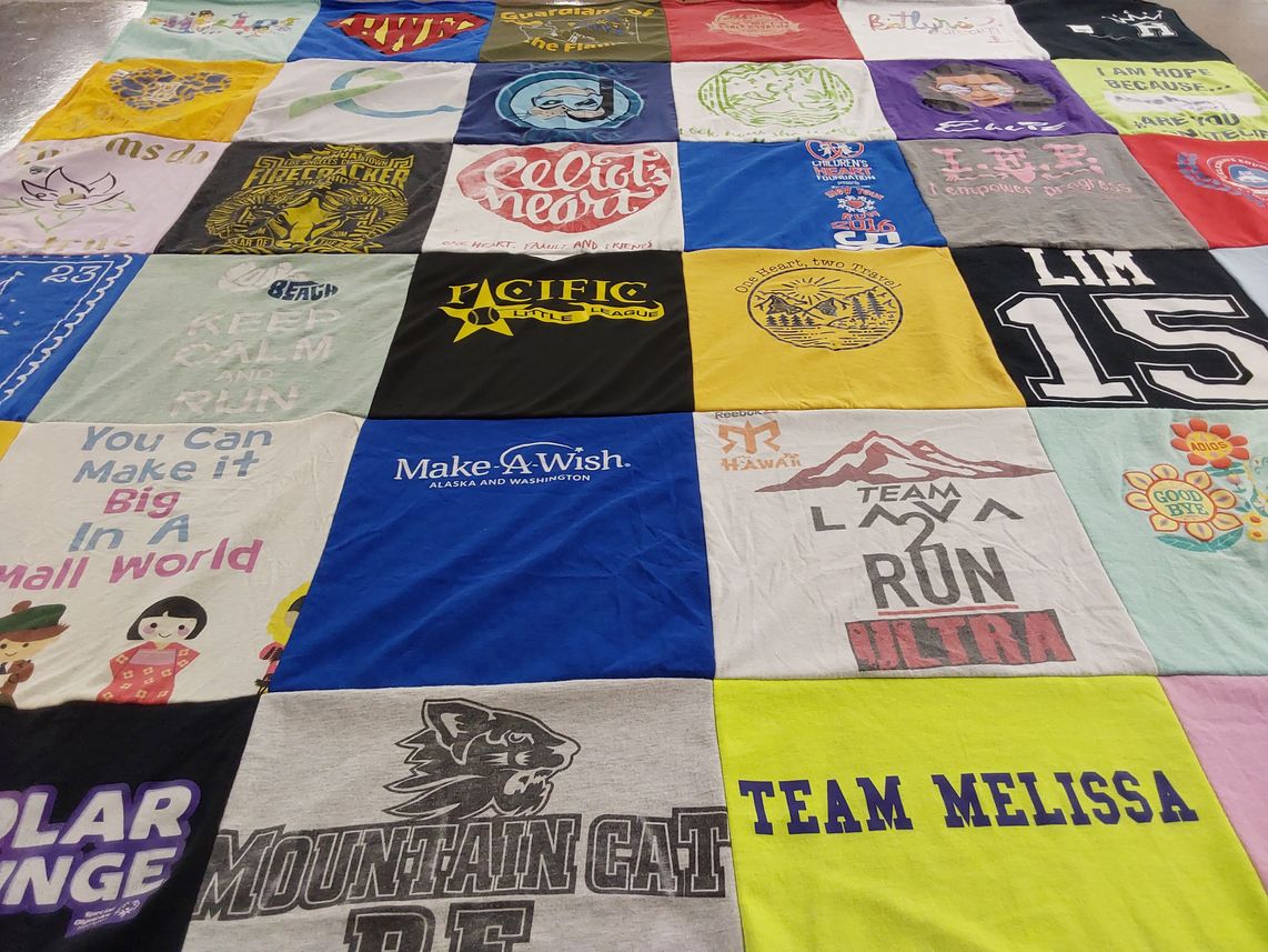 T-shirt quilt with running, volunteering themes by Melissa from WA