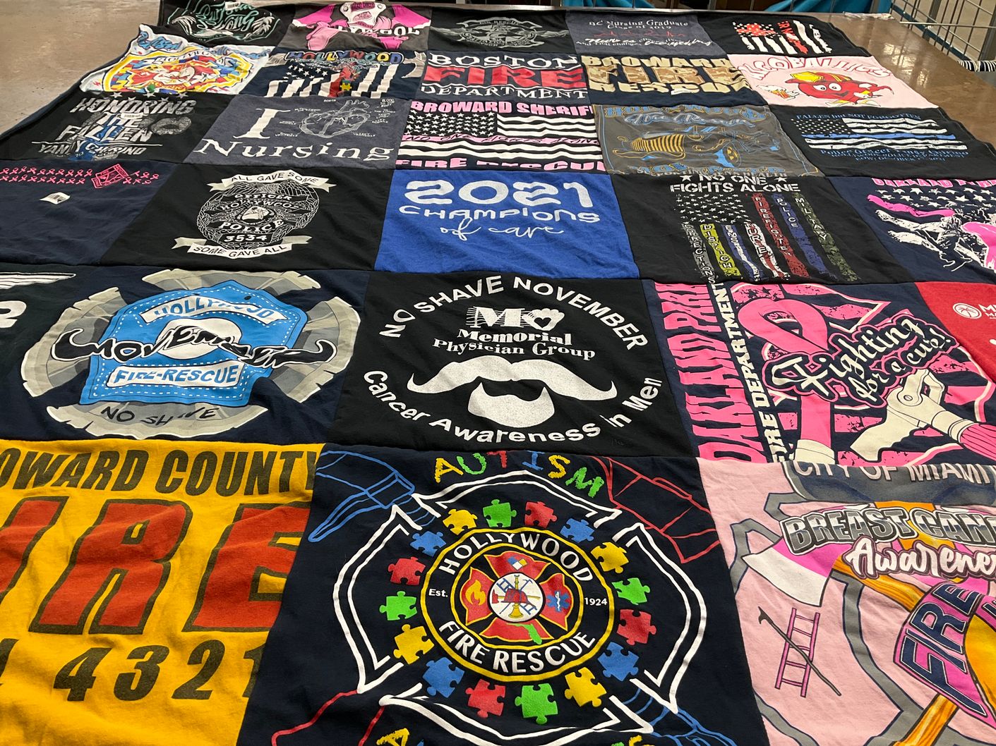 T-shirt quilt with firefighting, nursing themes by Kirstin from FL