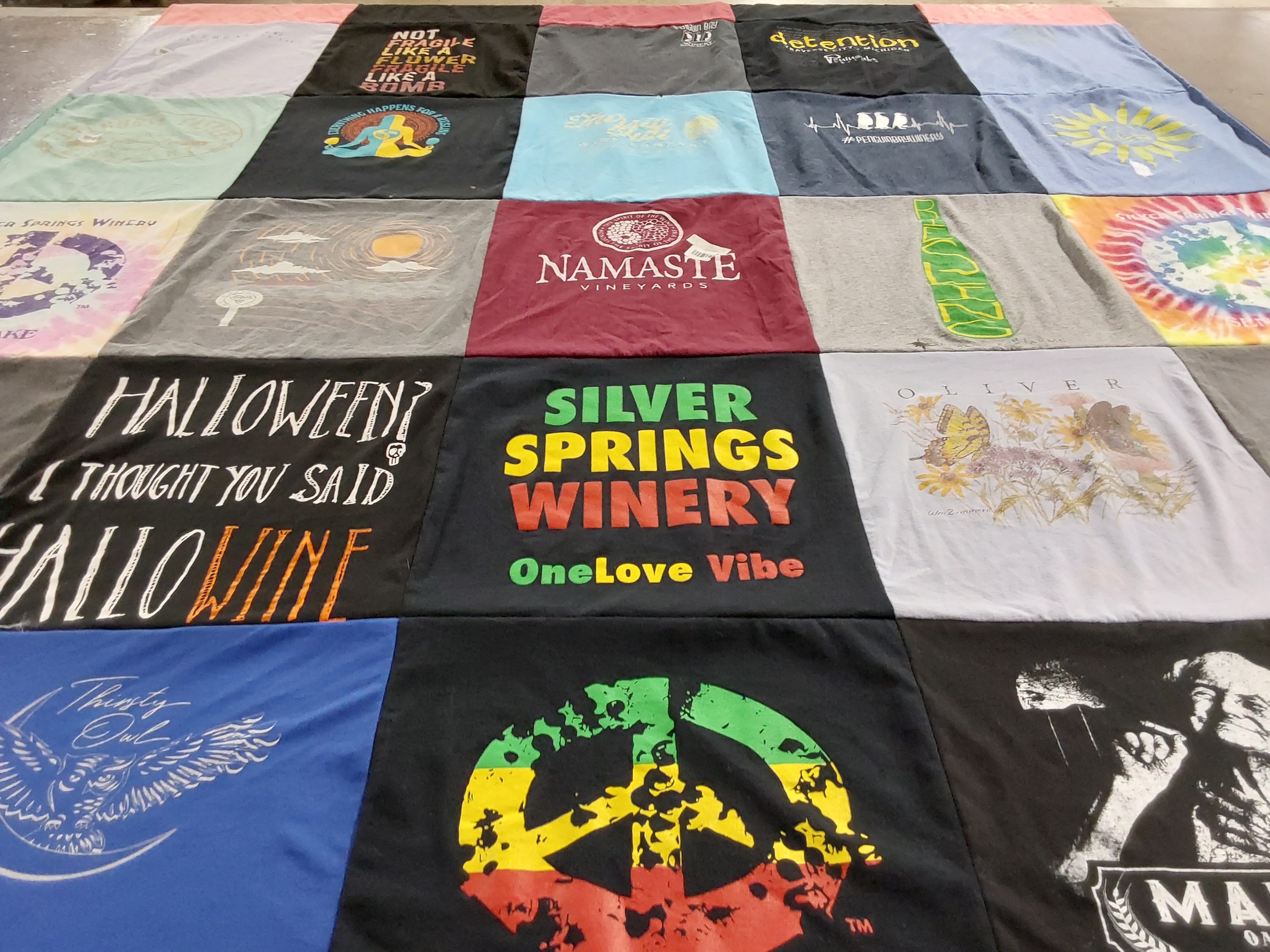 T-shirt quilt with wineries, halloween themes by Becky from IN