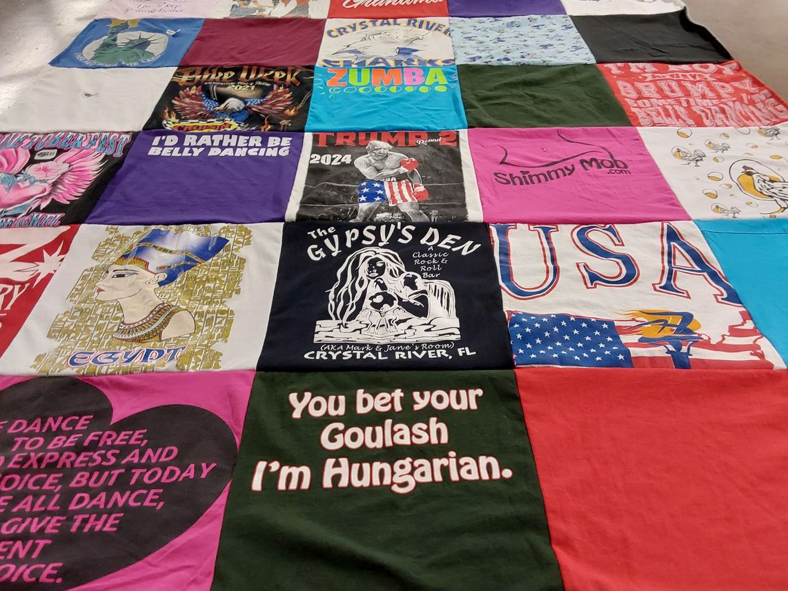 T-shirt quilt with dancing, rock music themes by Margaret from FL