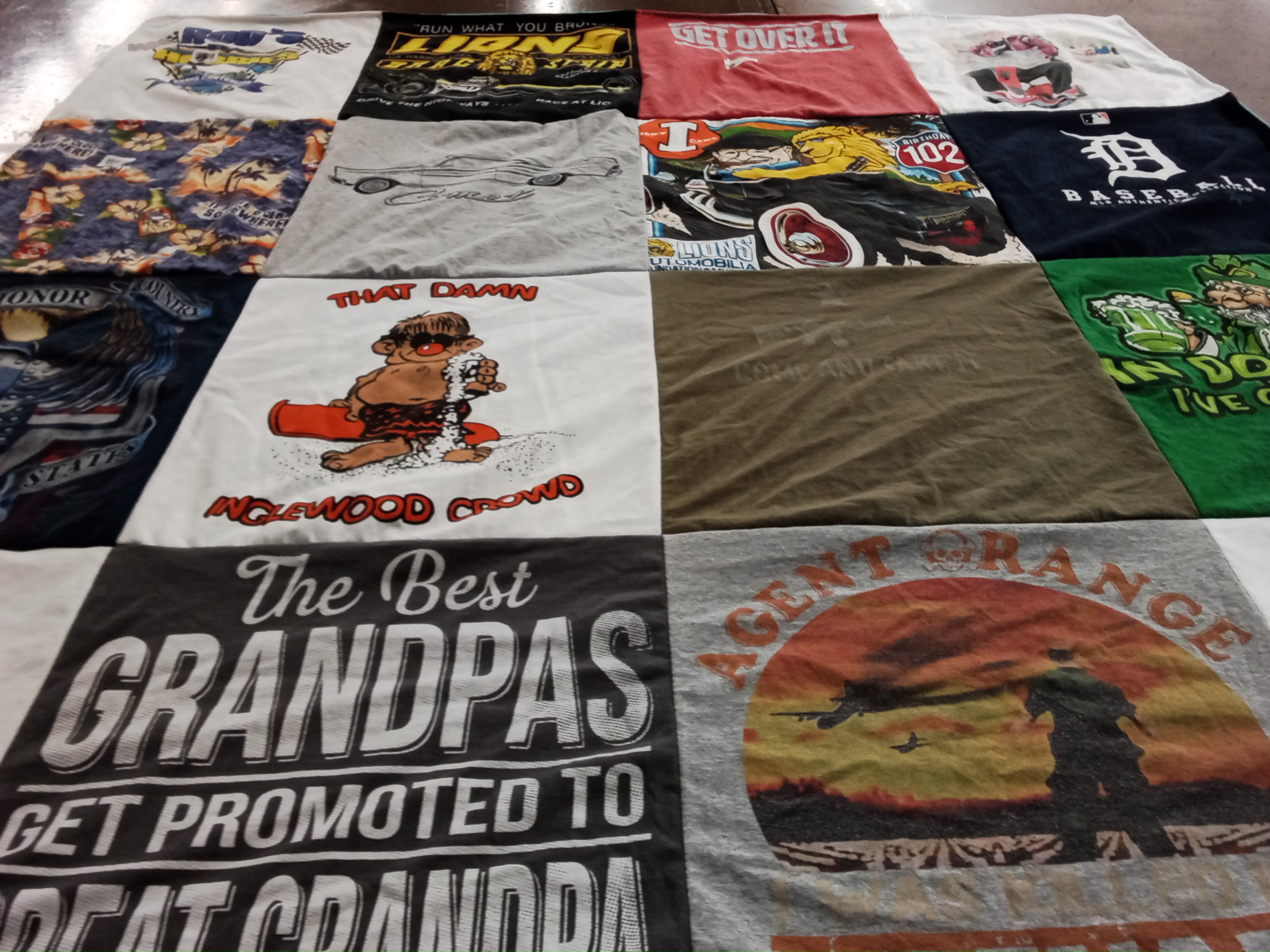 T-shirt quilt with family, sports themes by Donna from CA