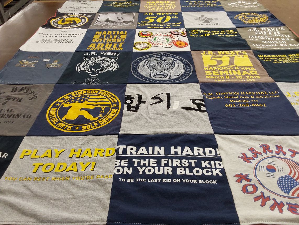T-shirt quilt with martial arts, self defense themes by Duane from MS