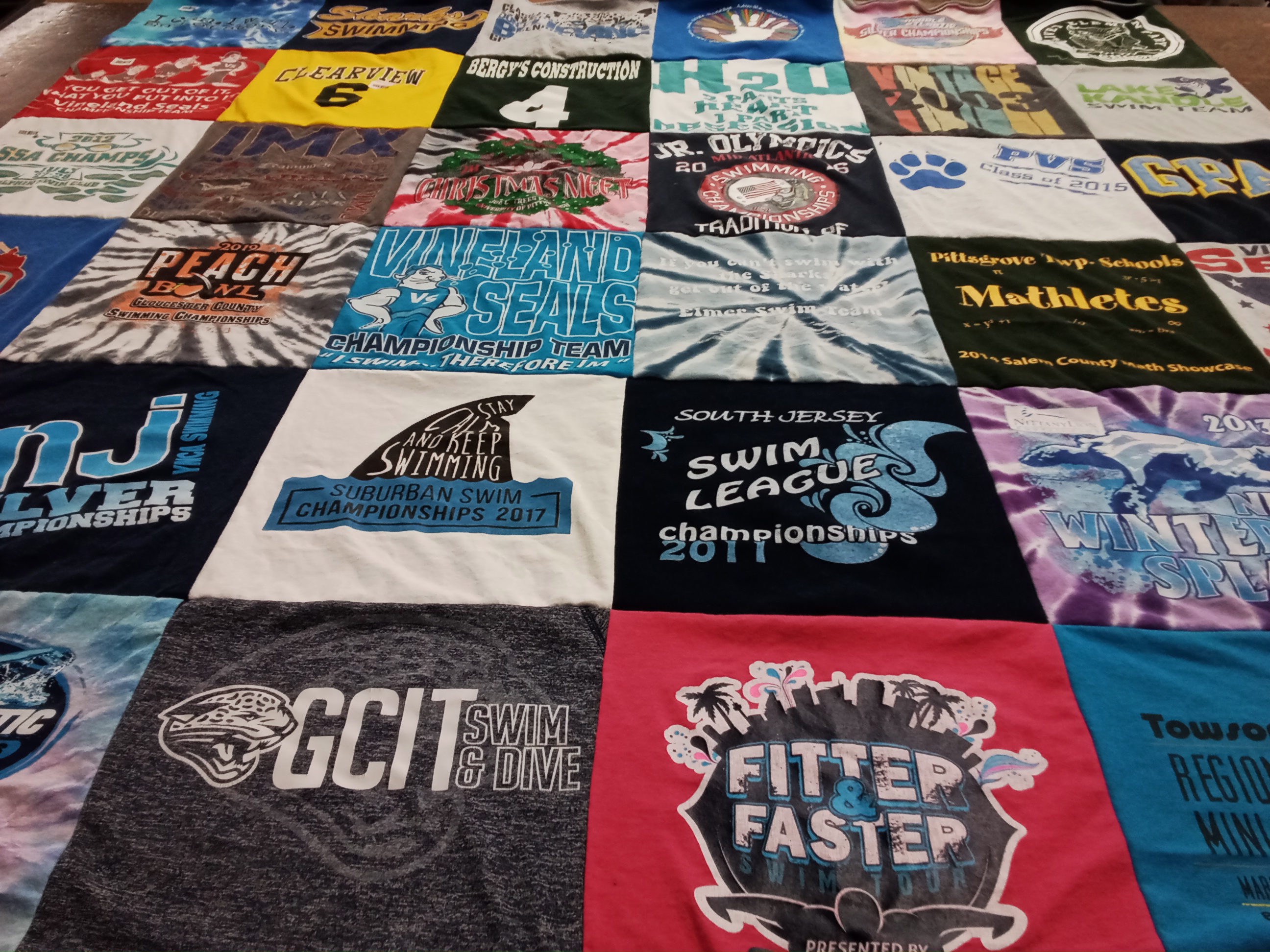 T-shirt quilt featuring vineyard seals championship team, pitman high school mathletes by Lori from NJ