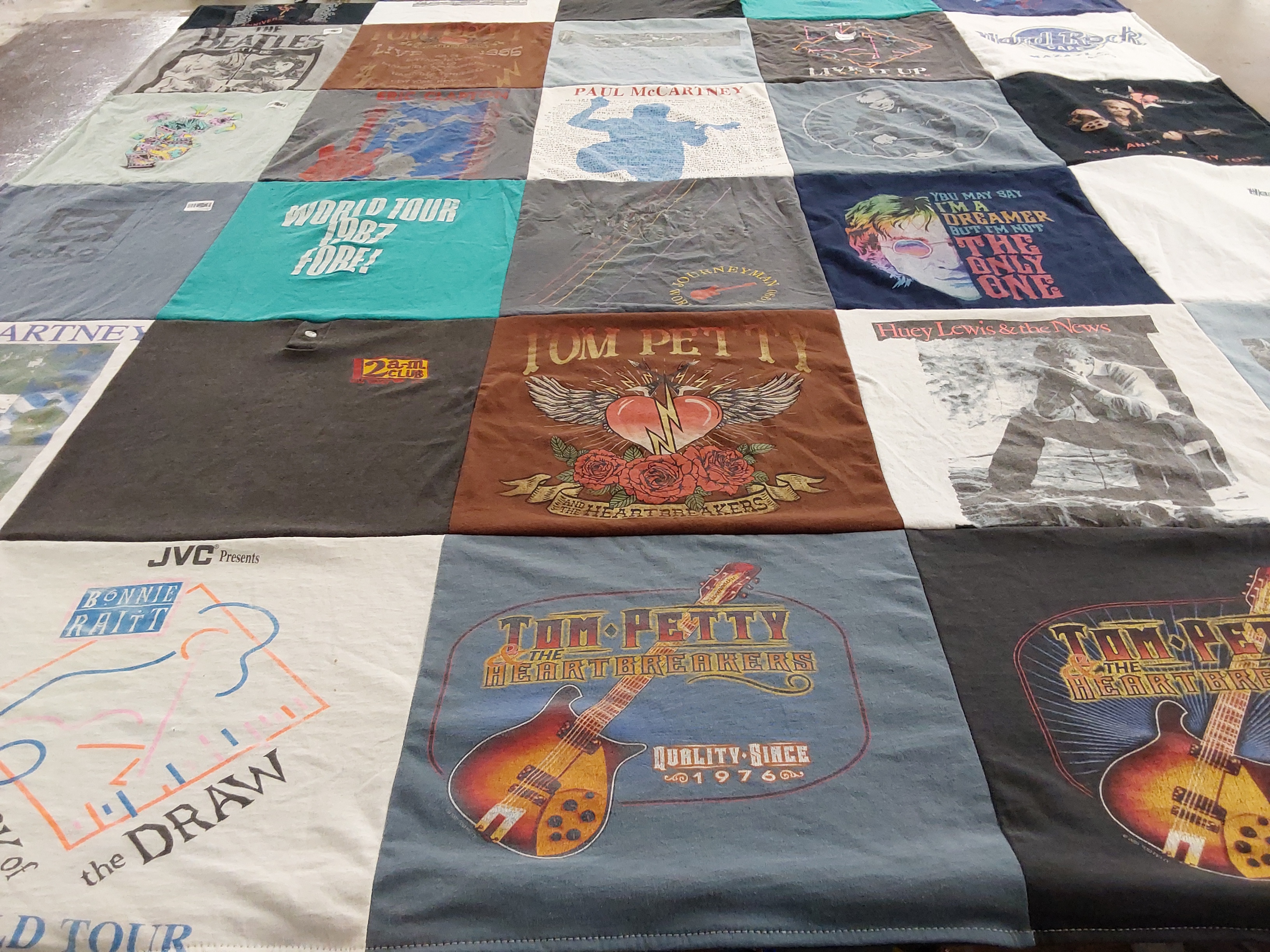 T-shirt quilt with music, concerts themes by Carole from CO