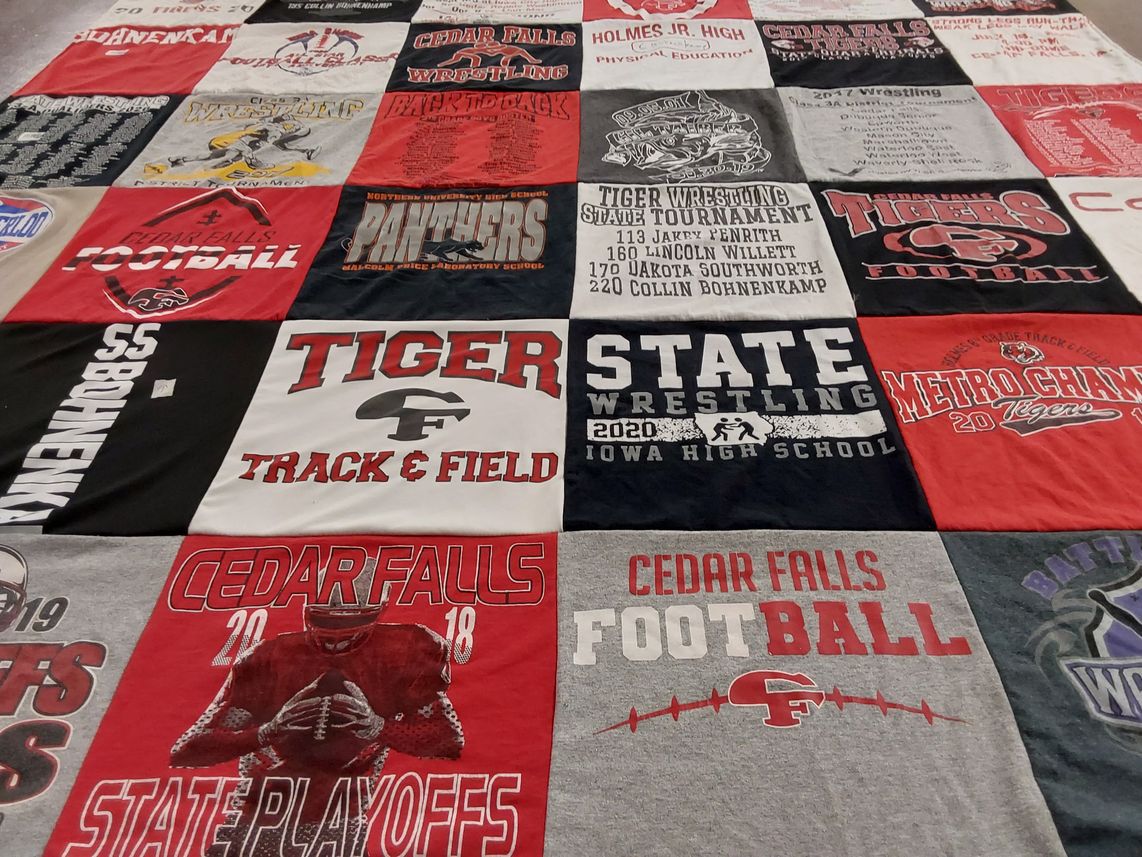 T-shirt quilt featuring cedar falls football, tiger wrestling by Janie from IA