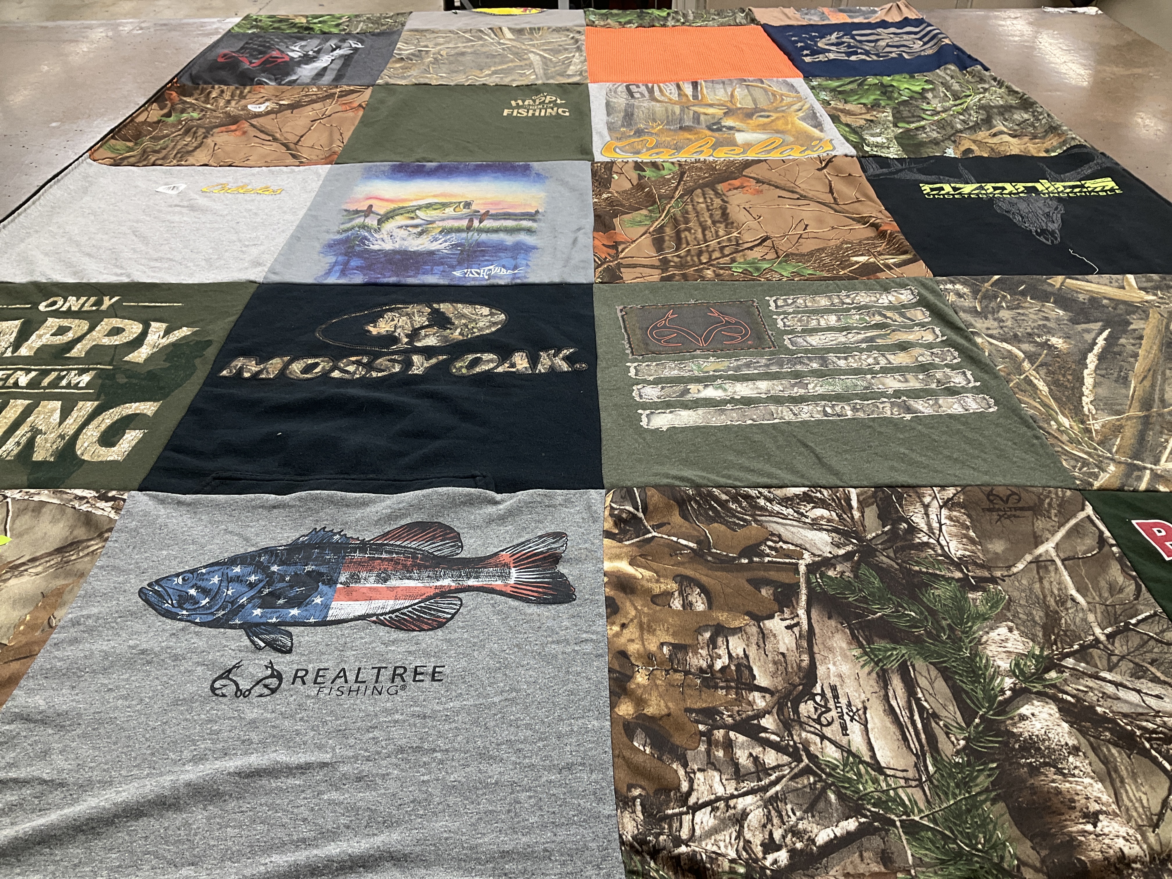 T-shirt quilt with fishing, hunting themes by Stacey from OH