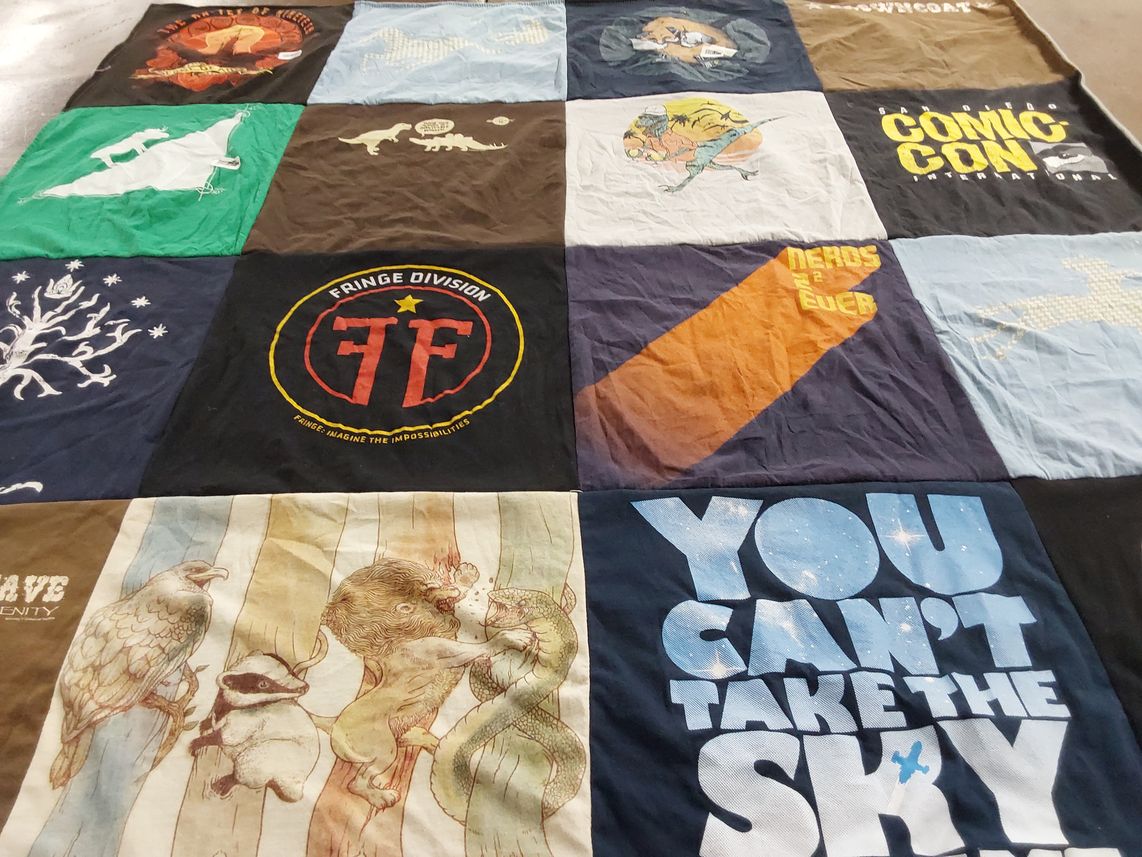 T-shirt quilt with comics, pop culture themes by Jackie from TX