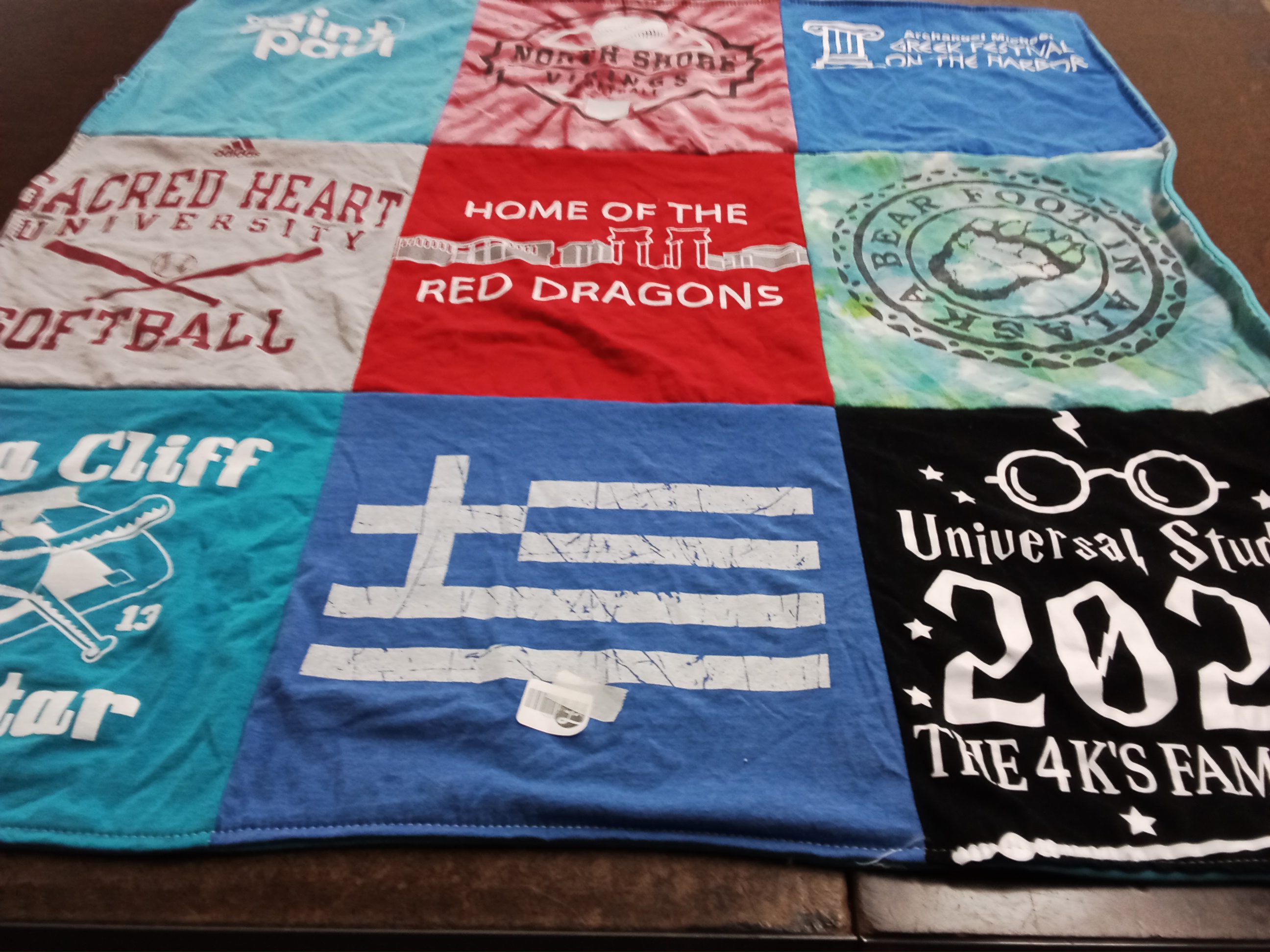 T-shirt quilt featuring red dragons by KATINA from NY