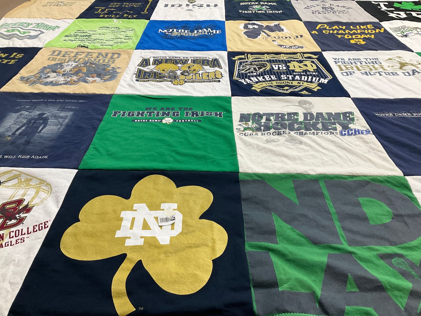 T-shirt quilt featuring notre dame fighting irish, boston college eagles by Sarah from OH