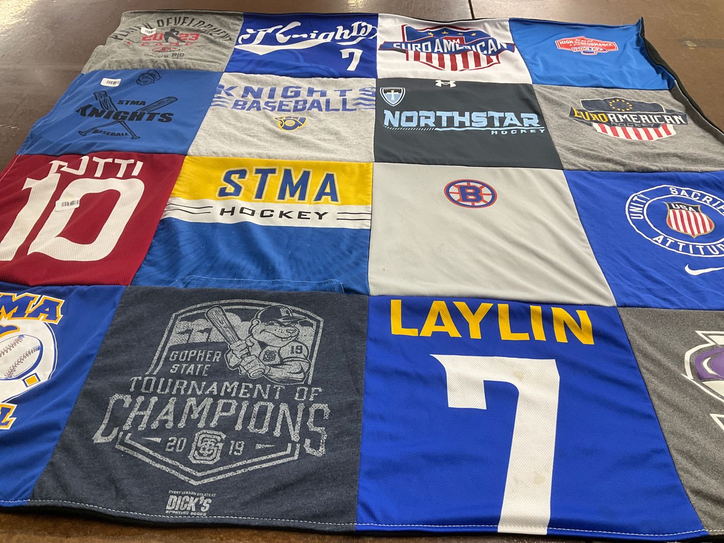 T-shirt quilt featuring stma knights baseball, stma hockey by Stacy from MN