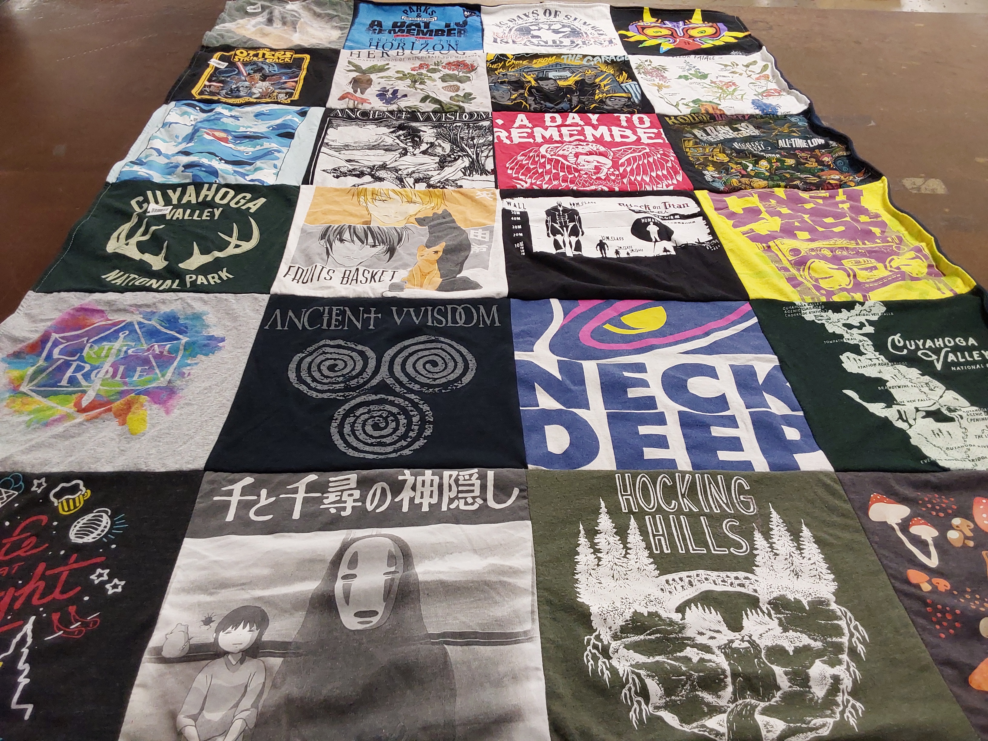 T-shirt quilt with anime, nature themes by Madi from OH