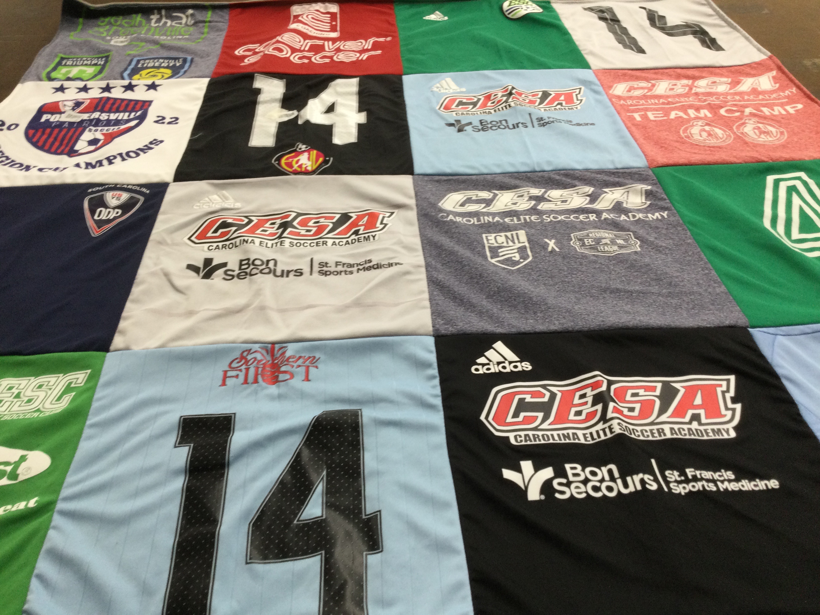 T-shirt quilt with soccer, sports themes by Laura from SC