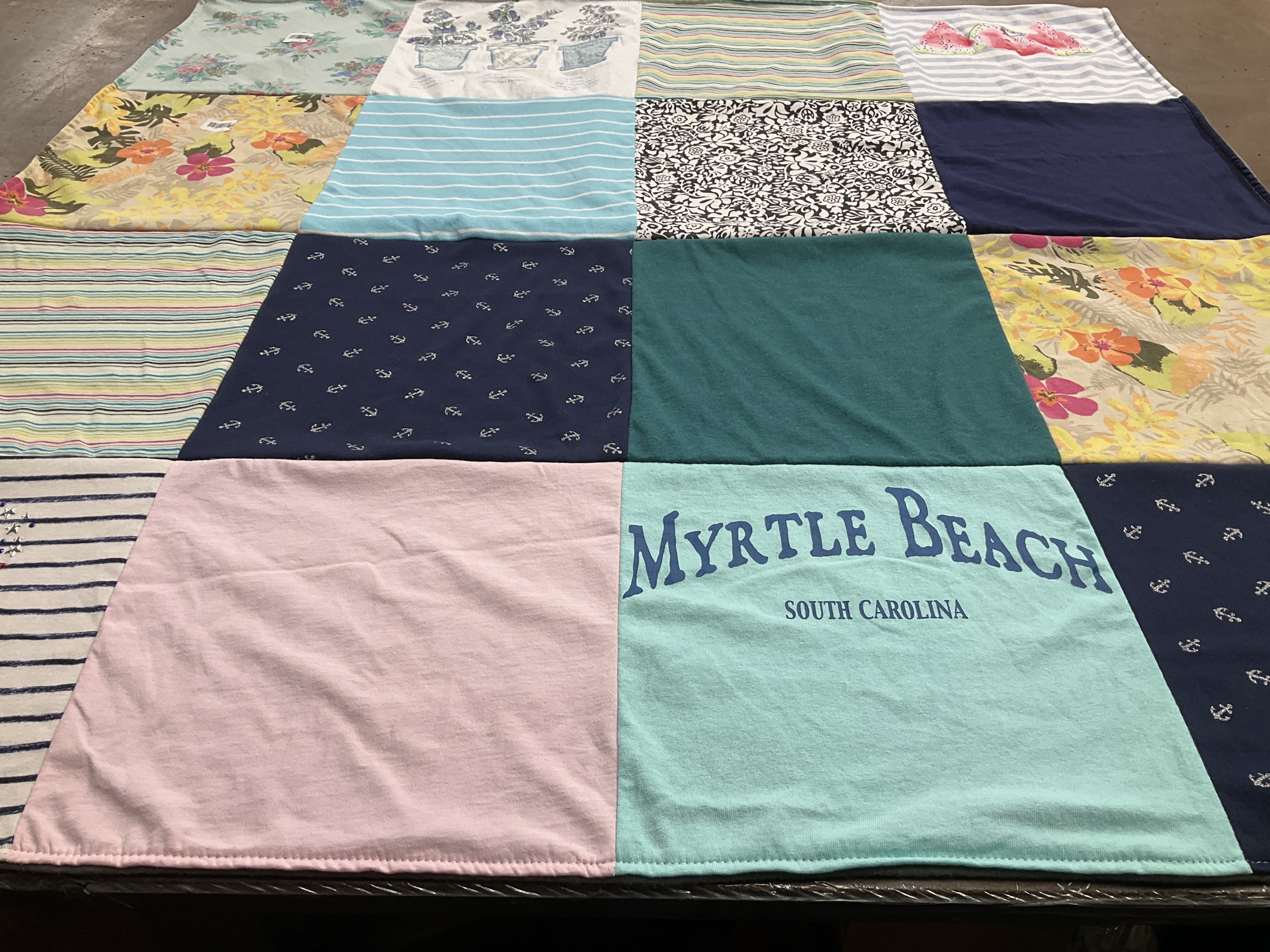 T-shirt quilt with beach, travel themes by Chelsie from WV