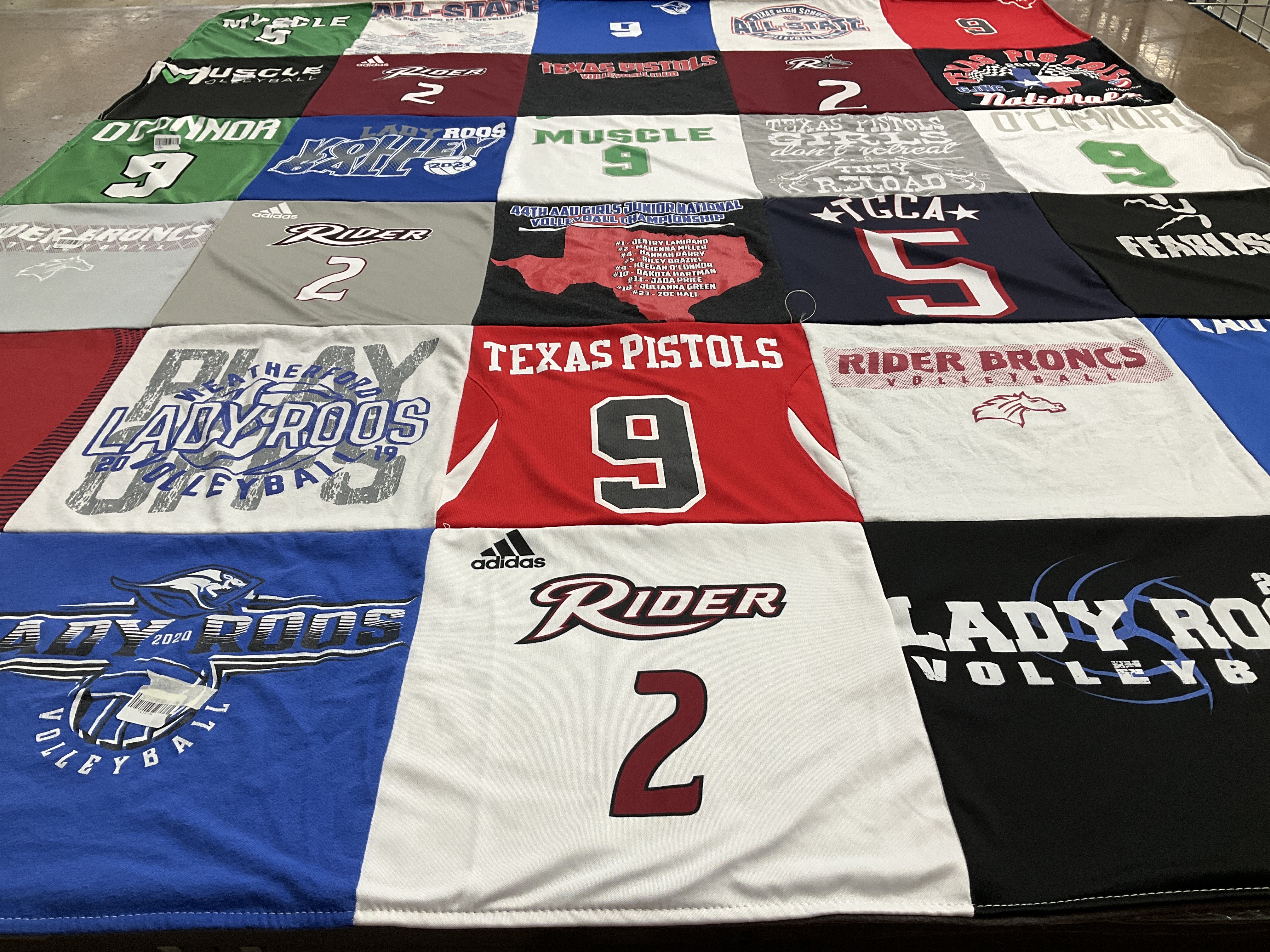 T-shirt quilt featuring rider broncs, lady roos volleyball by Janis from TX