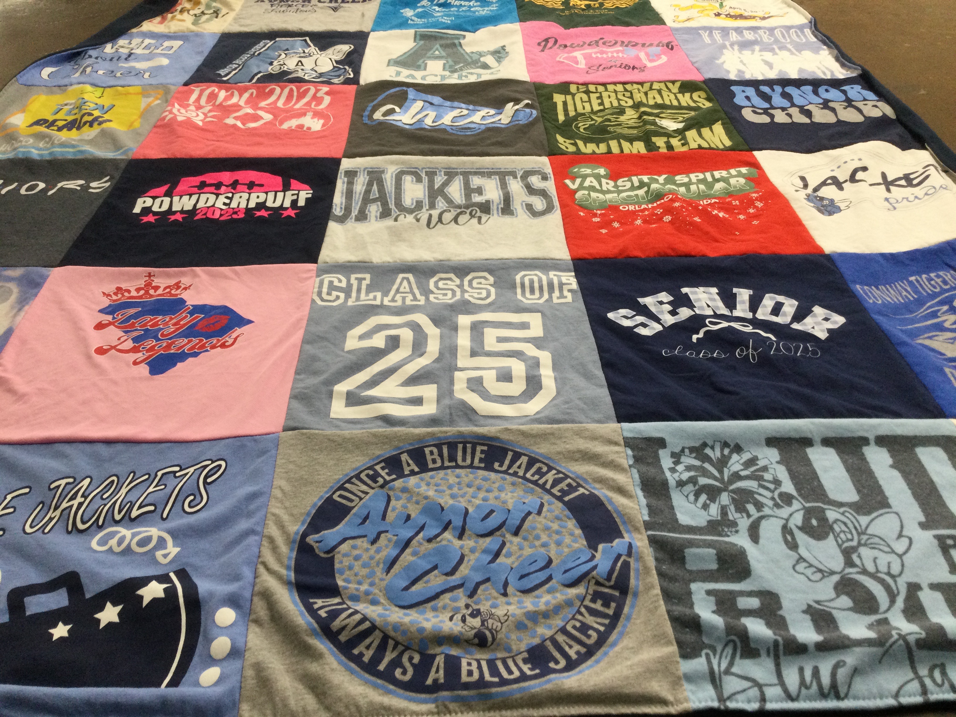 T-shirt quilt with cheerleading, school spirit themes by Sara from SC