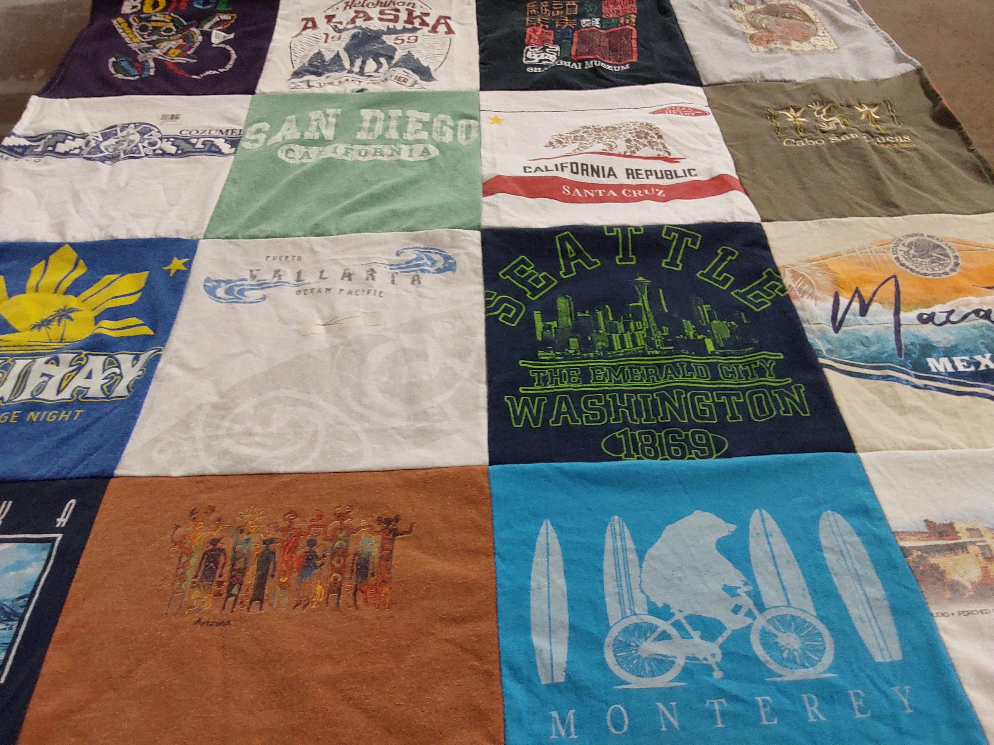 T-shirt quilt with travel, beaches themes by Marlinda from CA