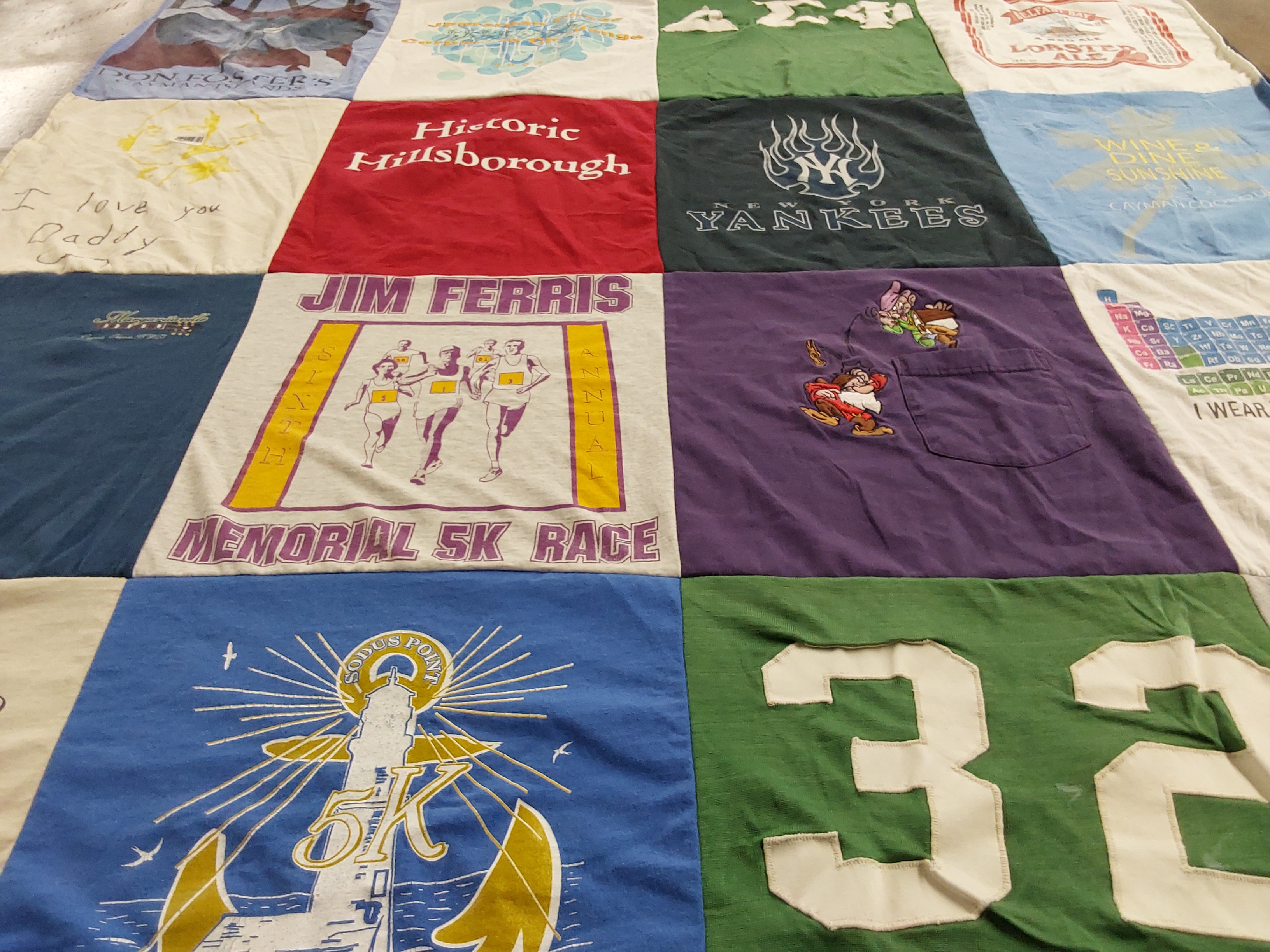 T-shirt quilt with running, events themes by Lisa from NY