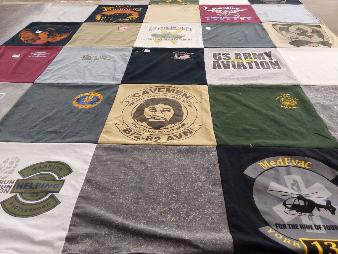 T-shirt quilt with veterans, military service themes by Gloria from PA