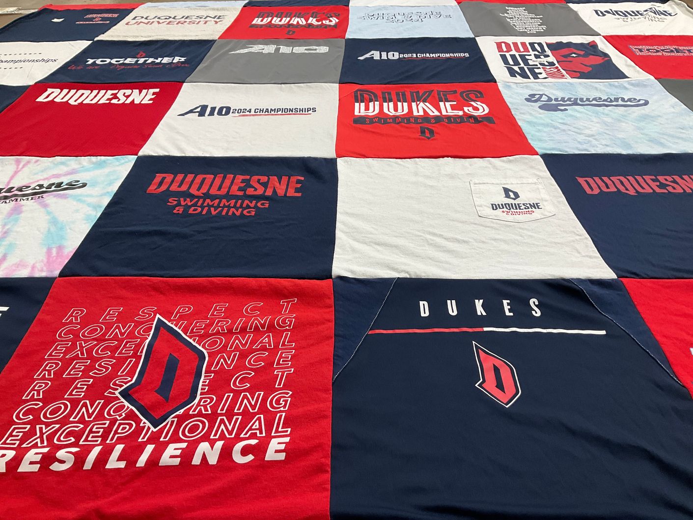 T-shirt quilt featuring duquesne university swimming and diving by sue from PA