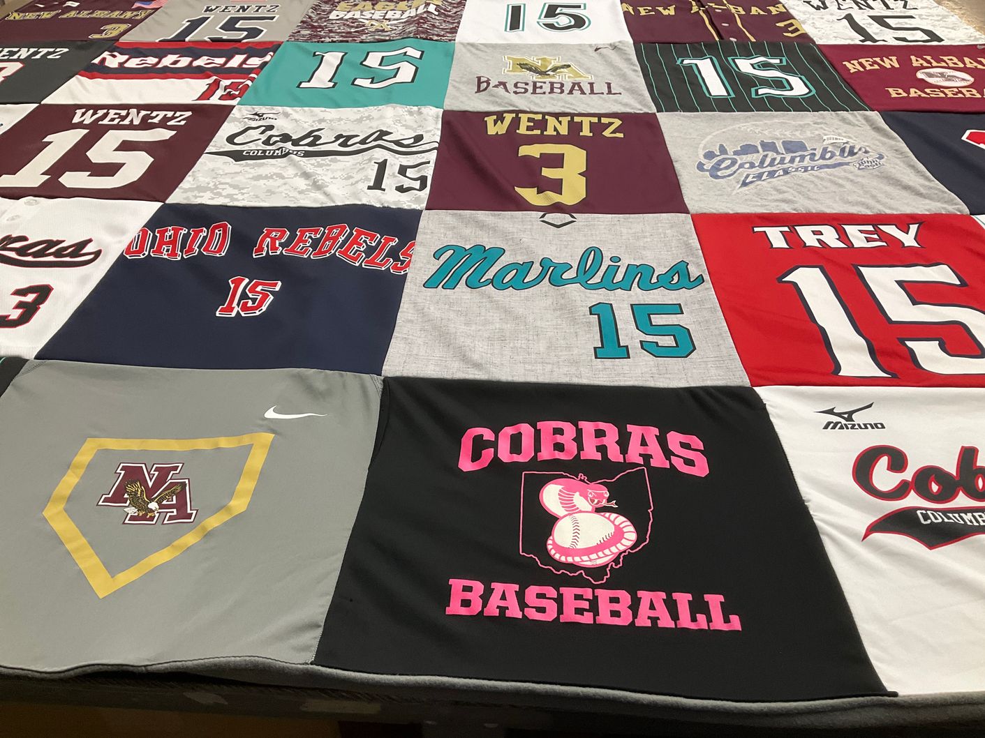 T-shirt quilt featuring cobras, marlins by Zibbi from OH