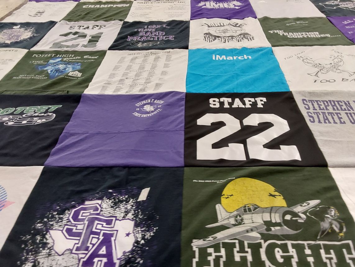 T-shirt quilt from stephen f. austin state university, poteet high school by Heidi from TX