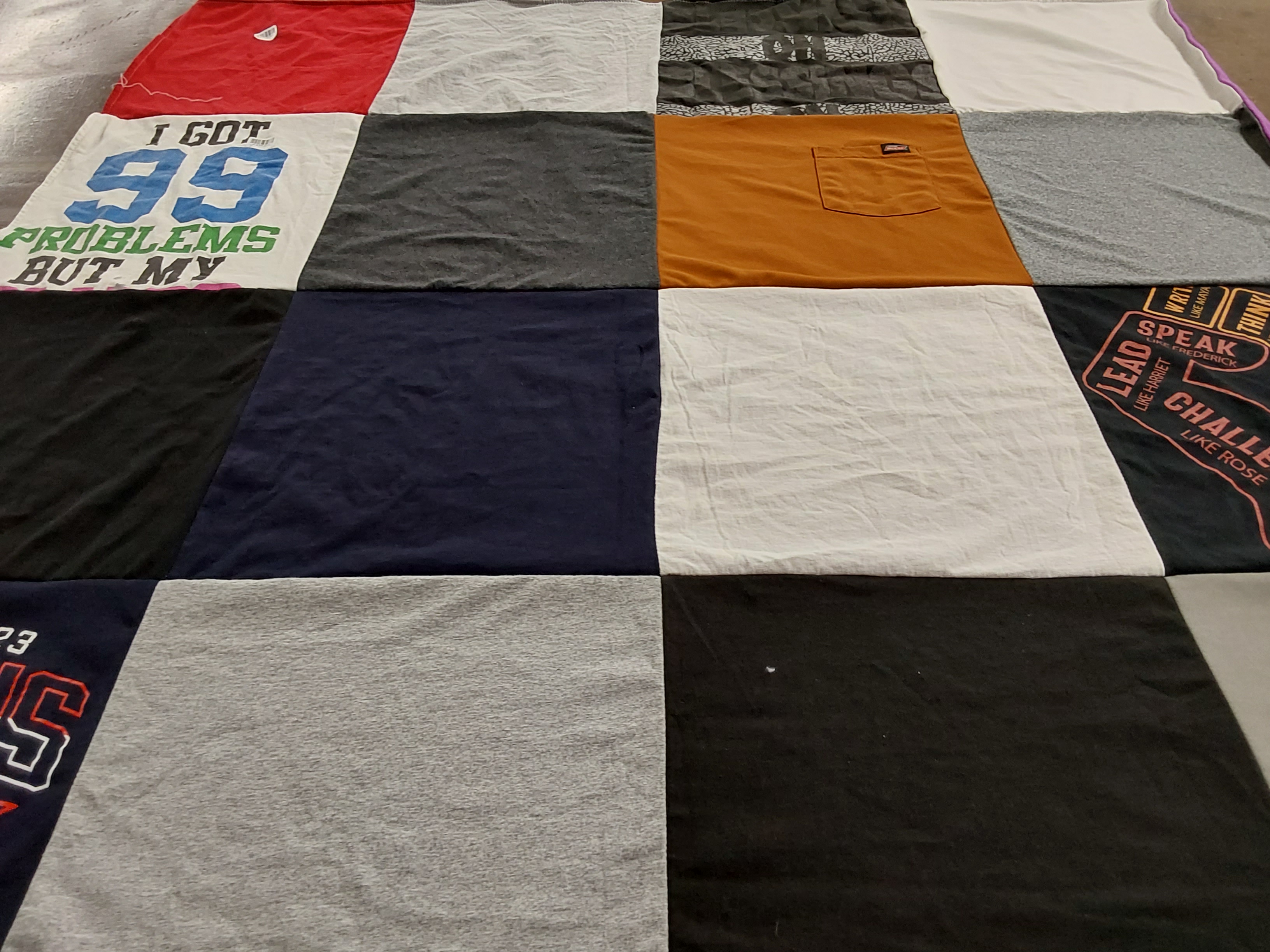 T-shirt quilt with sports, music themes by Chase from IN