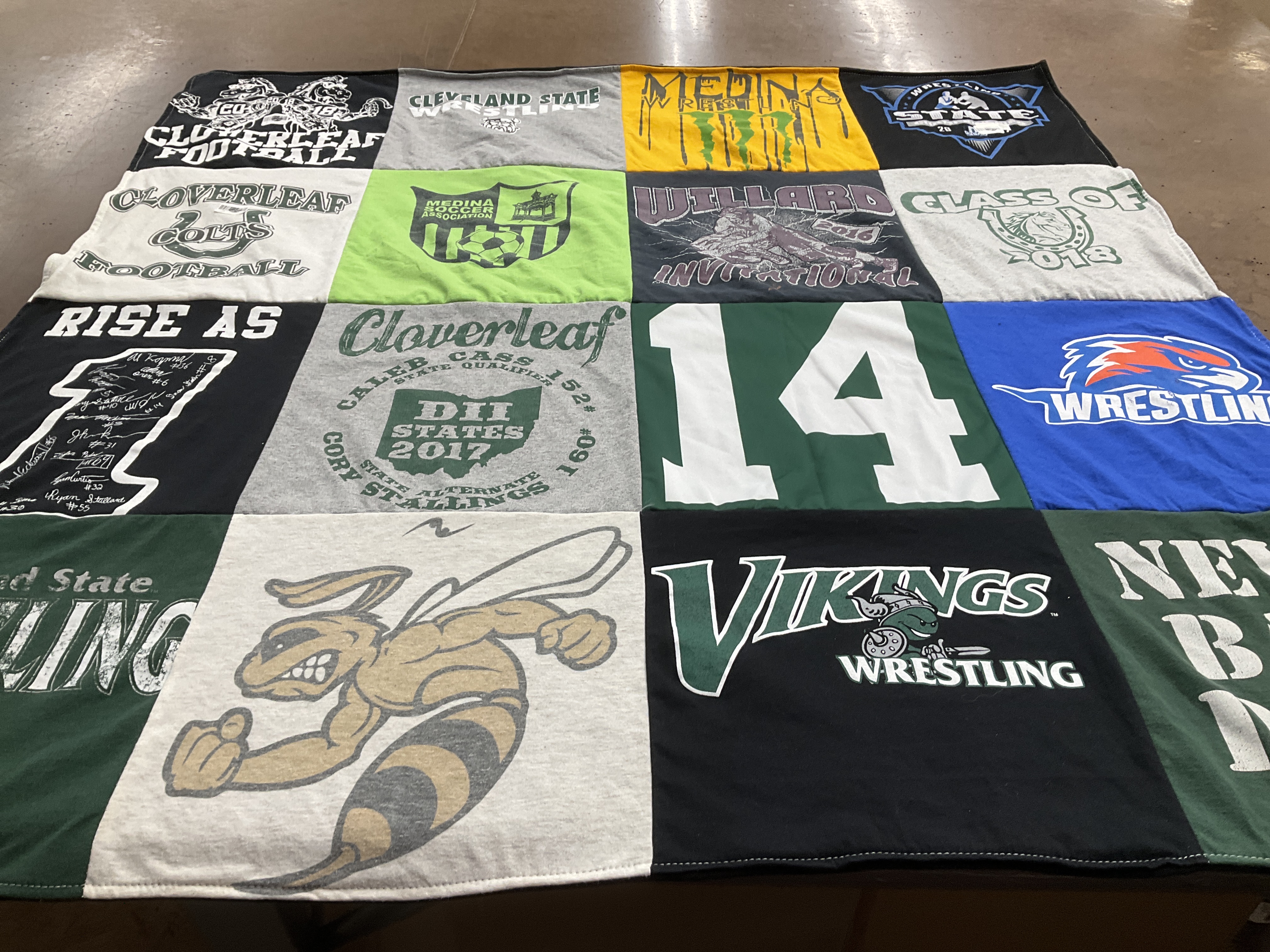 T-shirt quilt featuring cloverleaf high school football, medina high school wrestling by Anna from OH