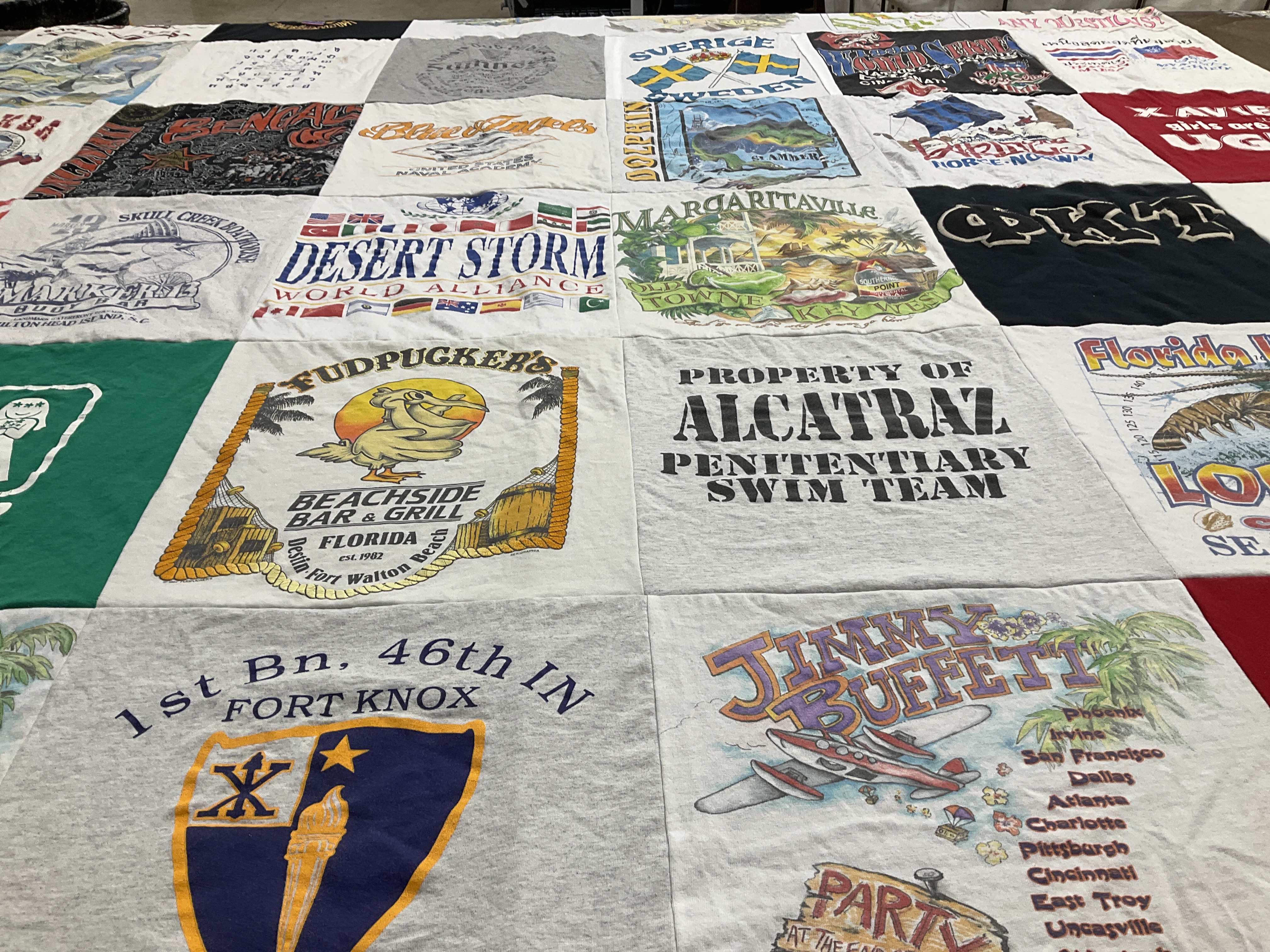 Custom Project Repat t-shirt quilt highlighting beaches, bars themes.