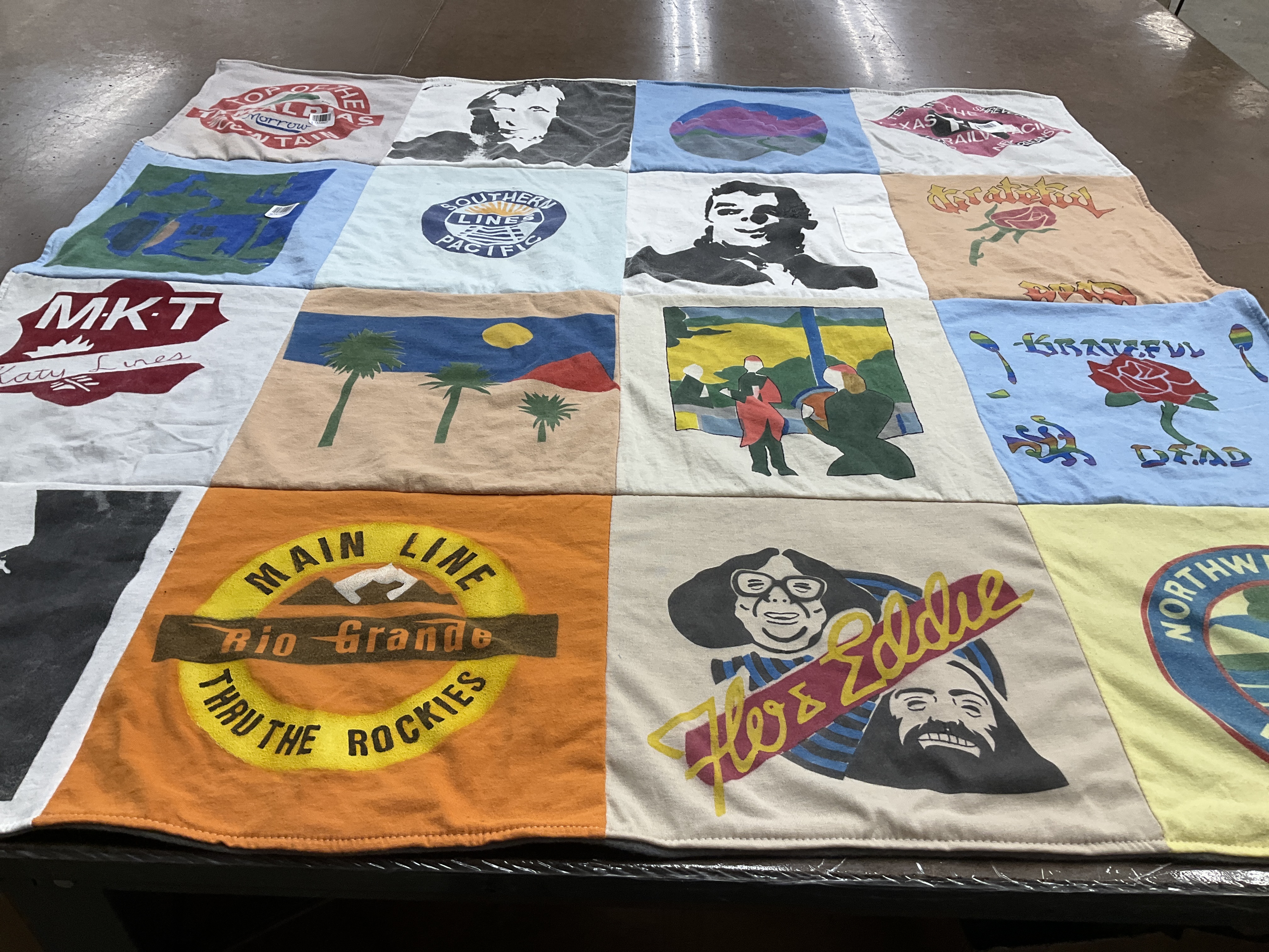 T-shirt quilt with rock music, trains themes by KT from CA