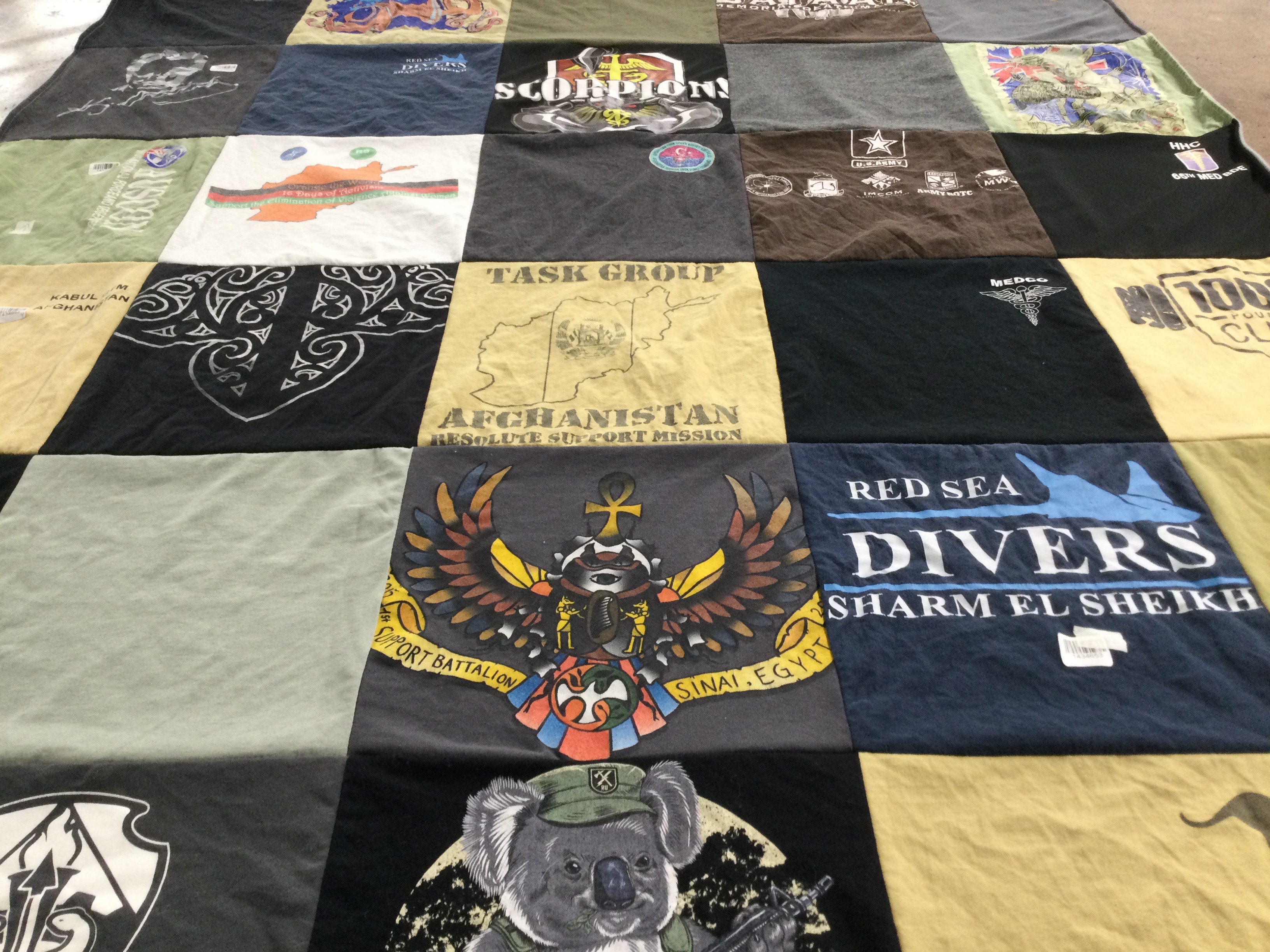 T-shirt quilt with military, travel themes by Tselane from GA