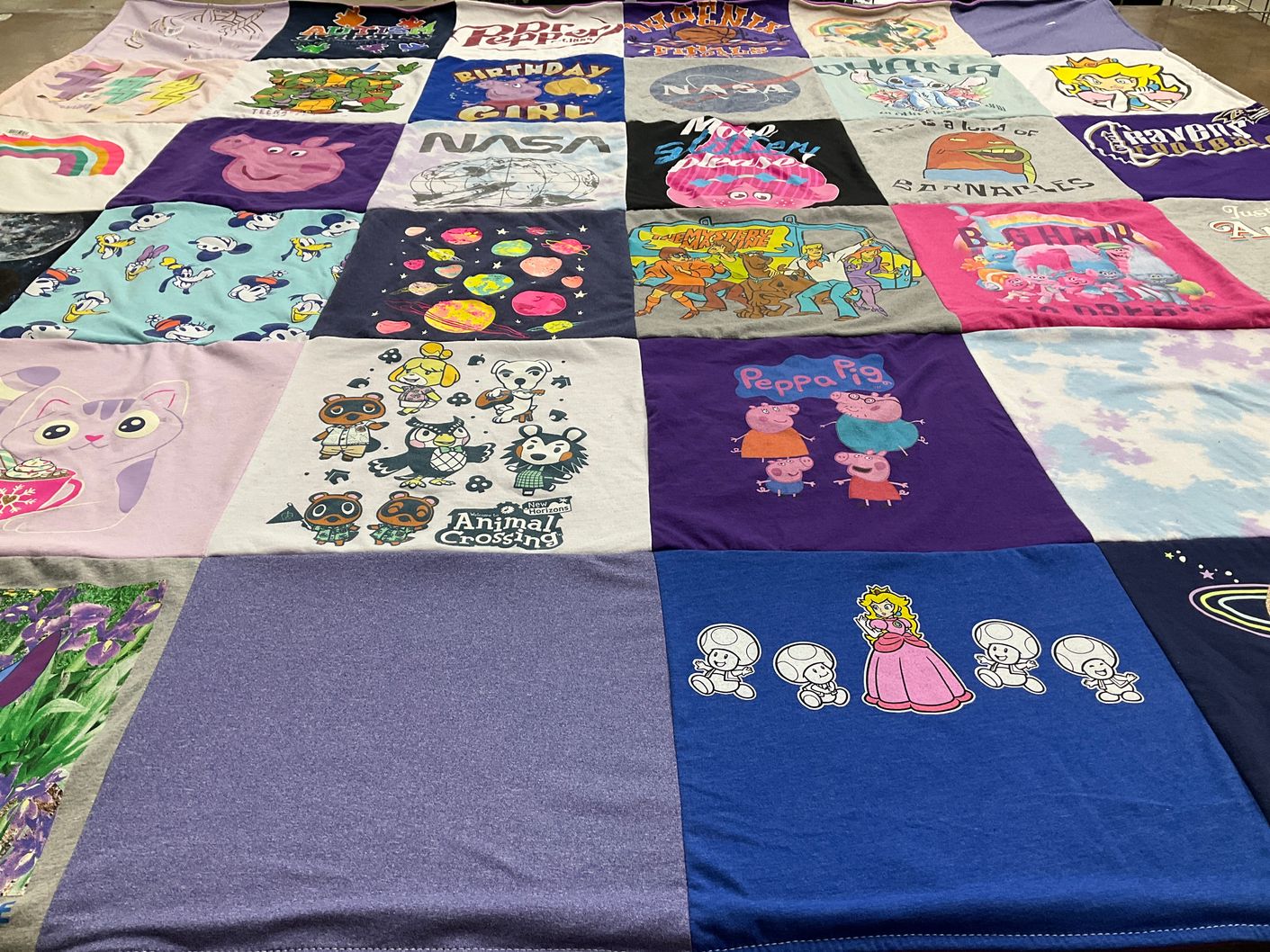 T-shirt quilt with cartoons, space themes by Tyson from AZ