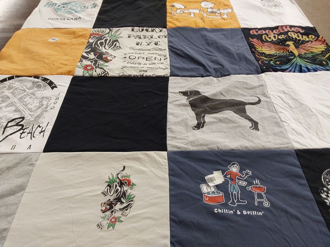 T-shirt quilt with travel, beach themes by Eryn from CA