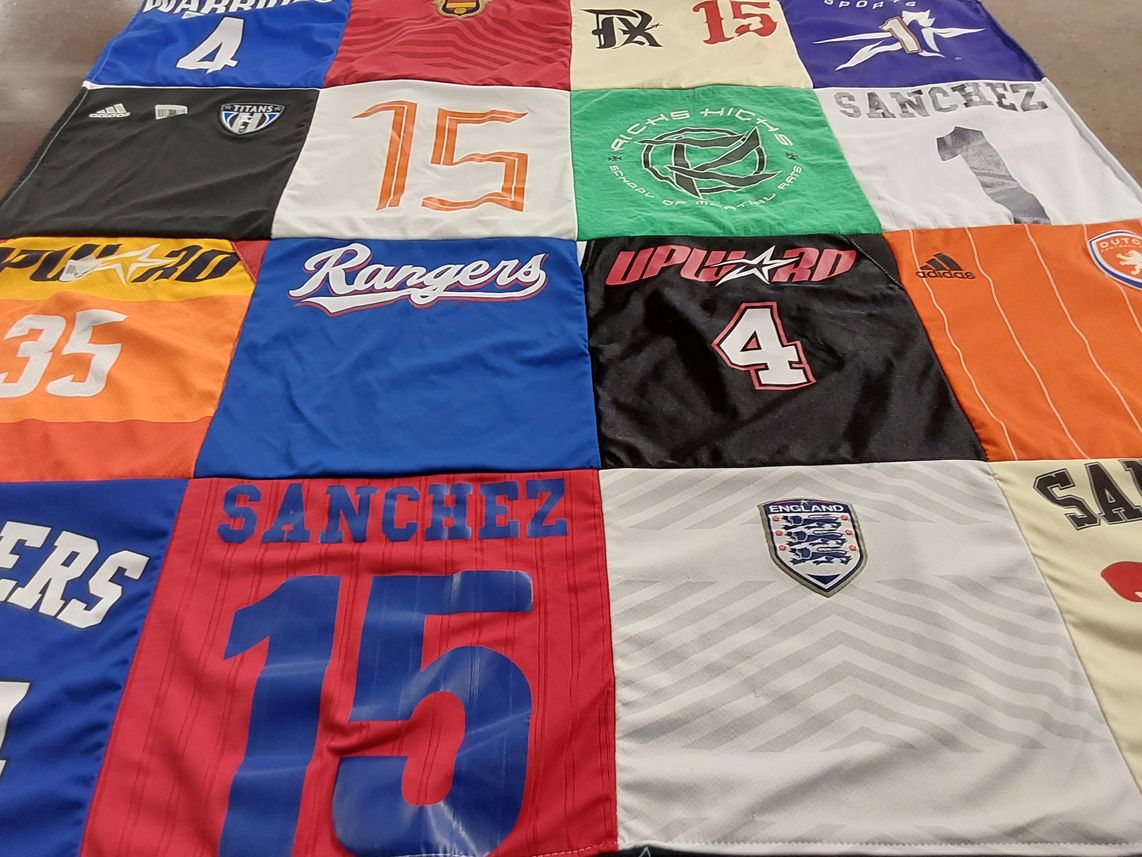 T-shirt quilt with sports, volleyball themes by Judith from TX