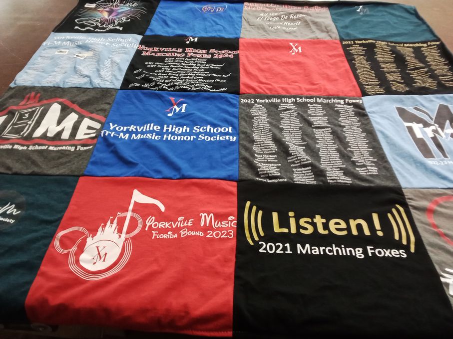 T-shirt quilt featuring marching foxes by Jennifer from IL