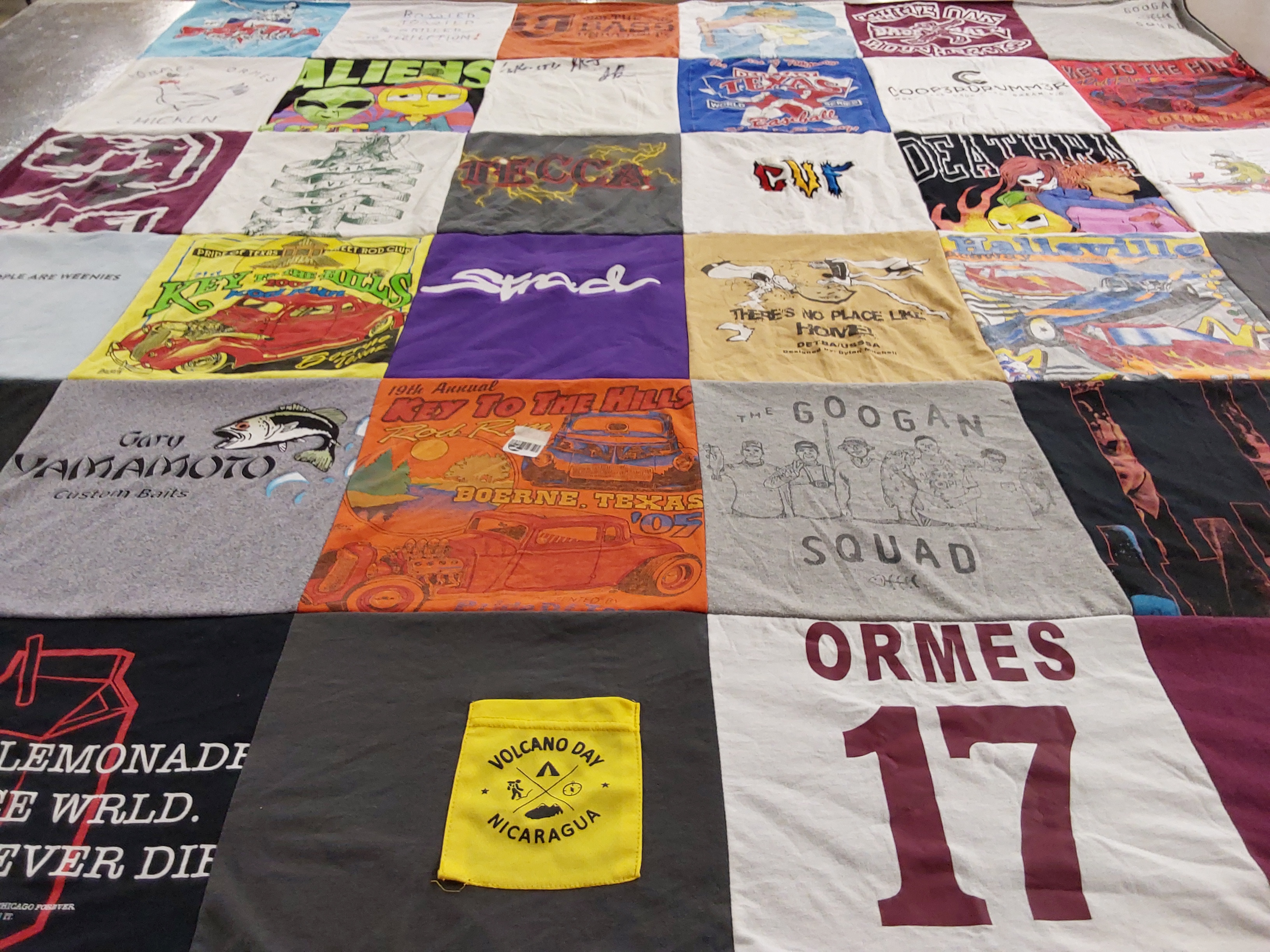 T-shirt quilt with fishing, cars themes by Amy from TX