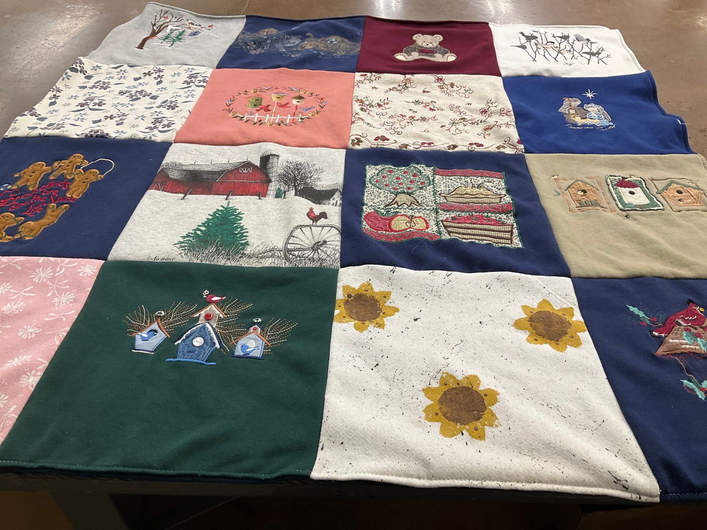T-shirt quilt with nature, holiday celebrations themes by Lisa from PA