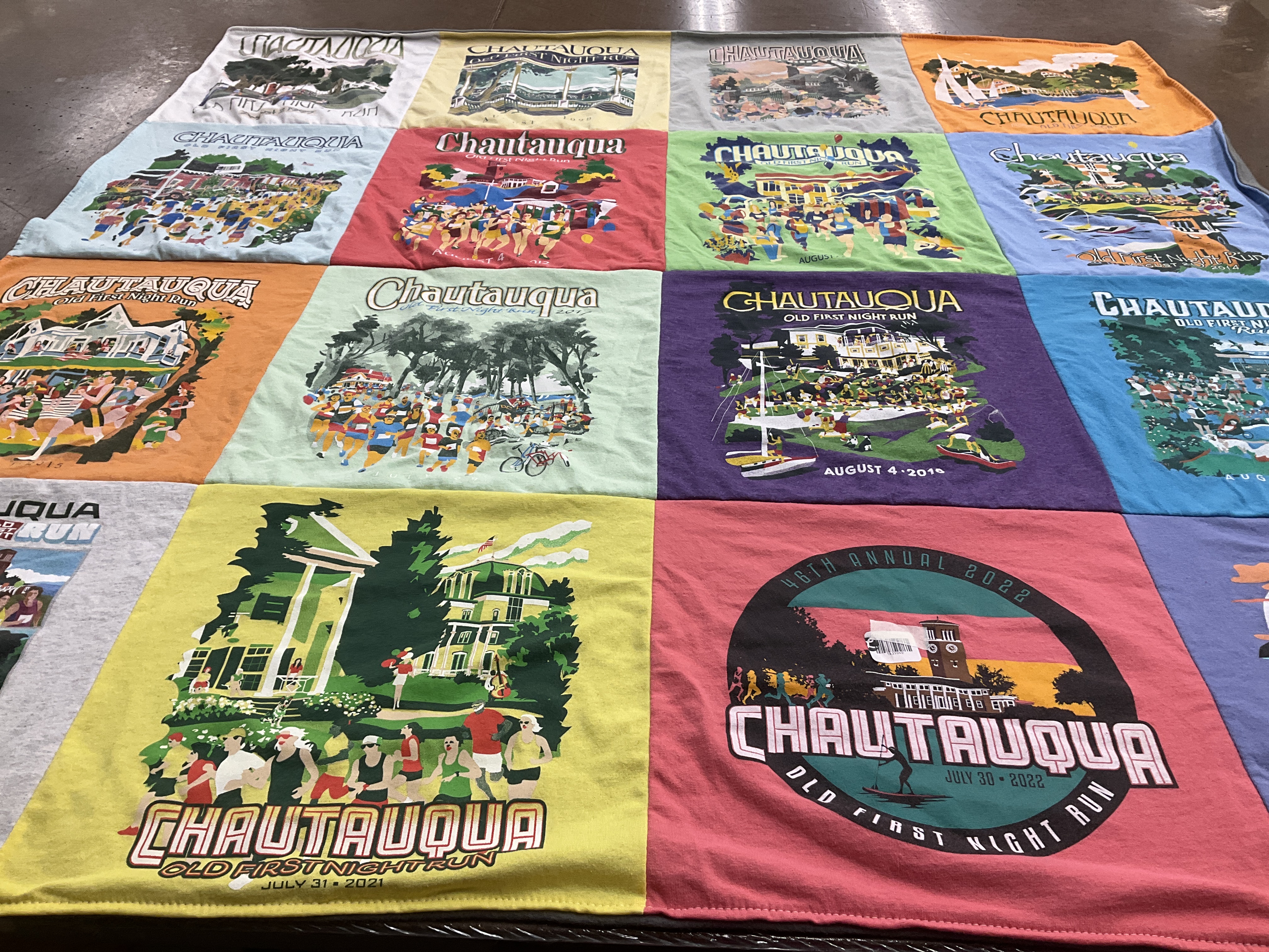 T-shirt quilt with running, community events themes by Krista from MD