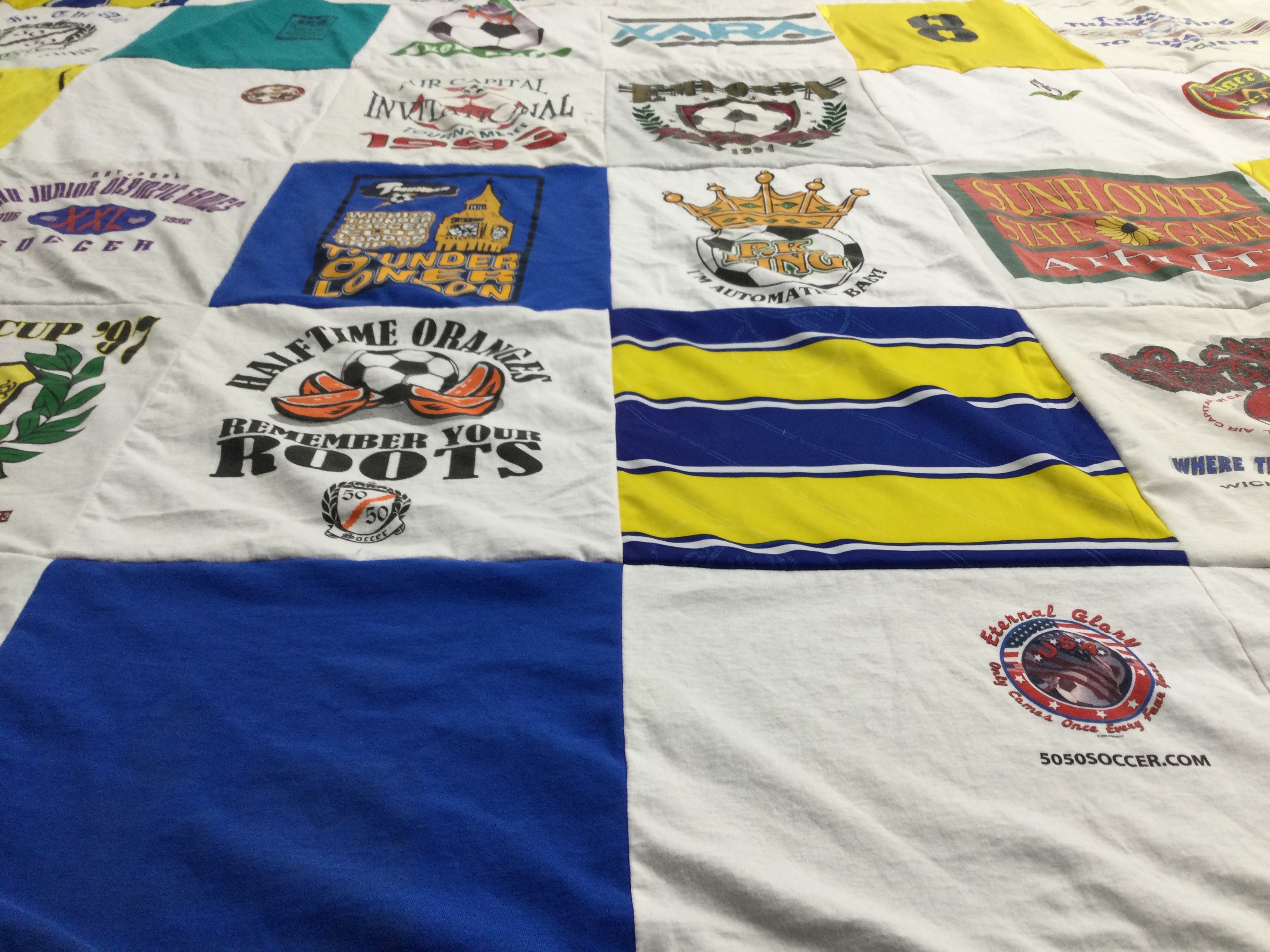 T-shirt quilt with soccer, sports themes by Mary from KS