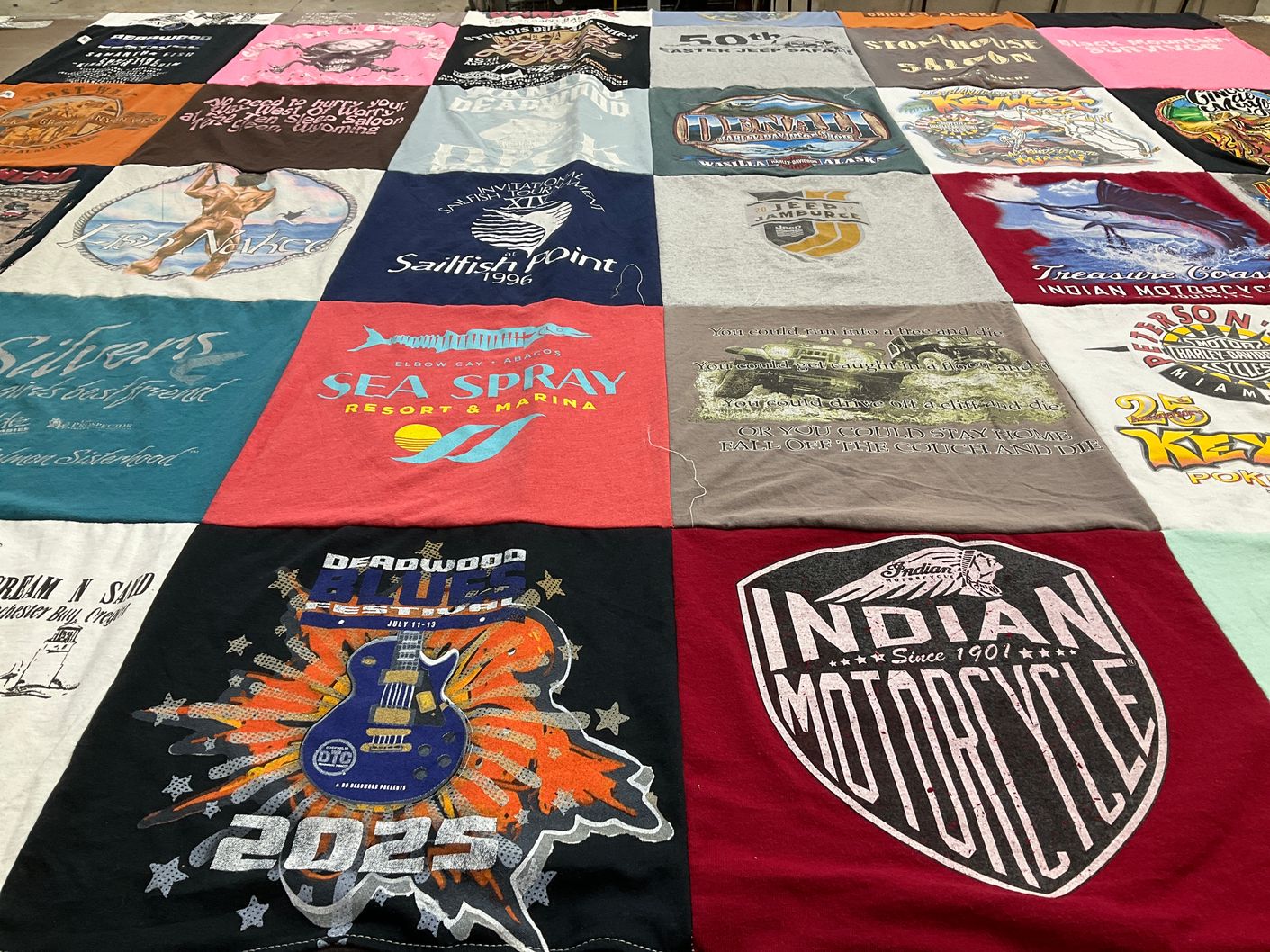 T-shirt quilt with fishing, motorcycles themes by Dave from SD