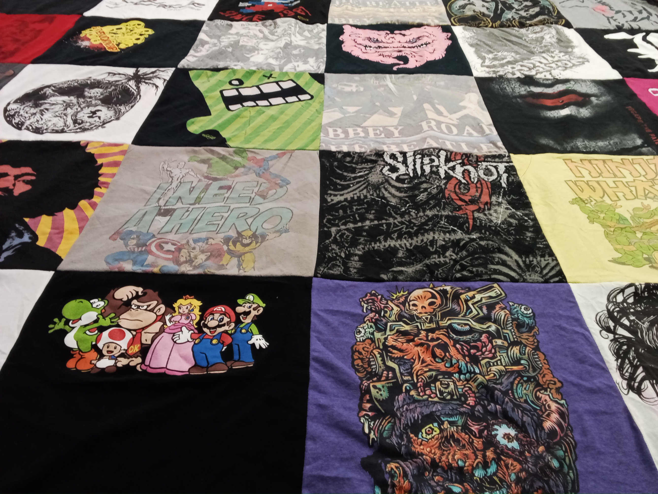 T-shirt quilt with music, video games themes by Patricia from OR