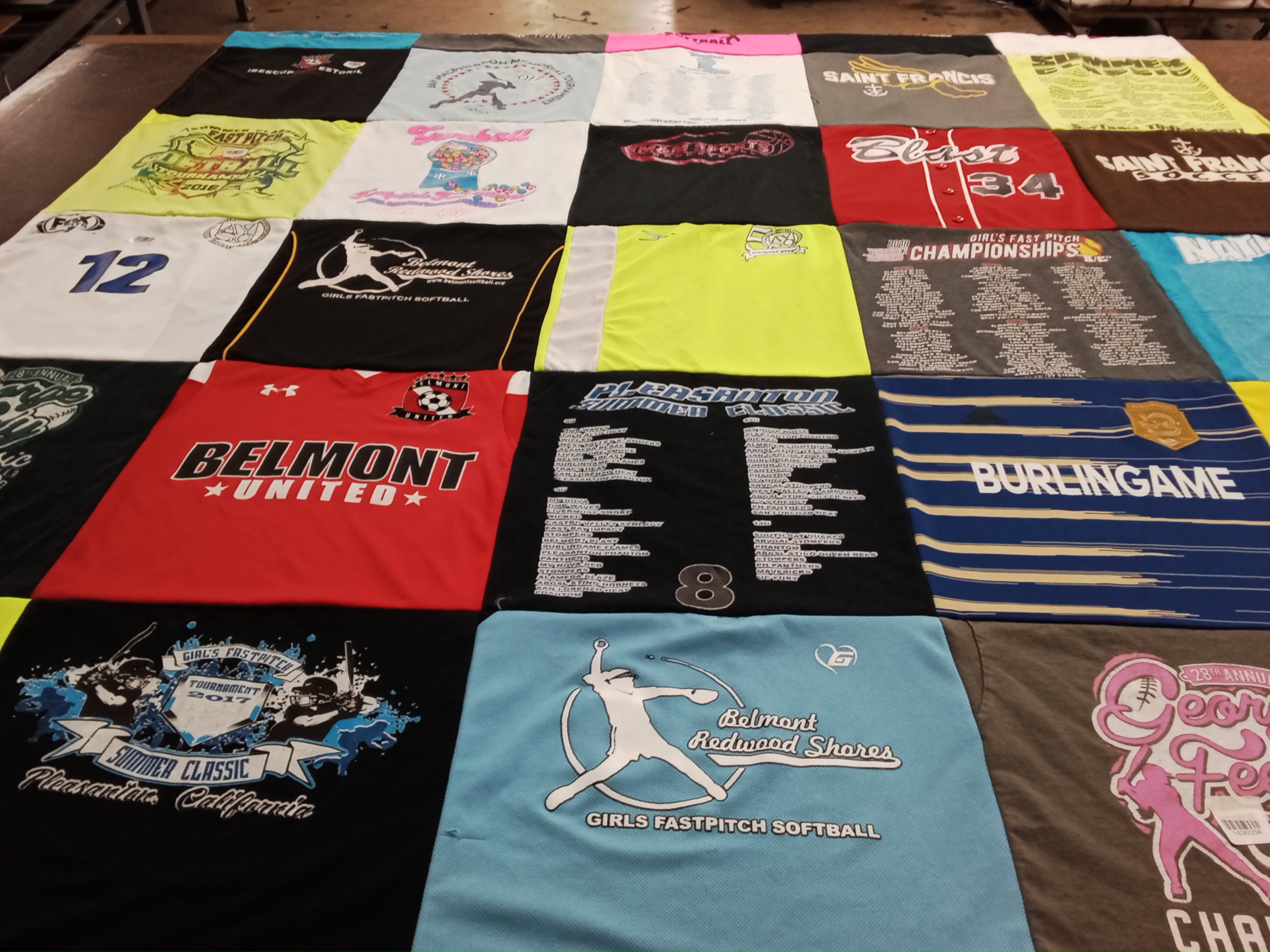 T-shirt quilt with softball, sports themes by Joanne from CA