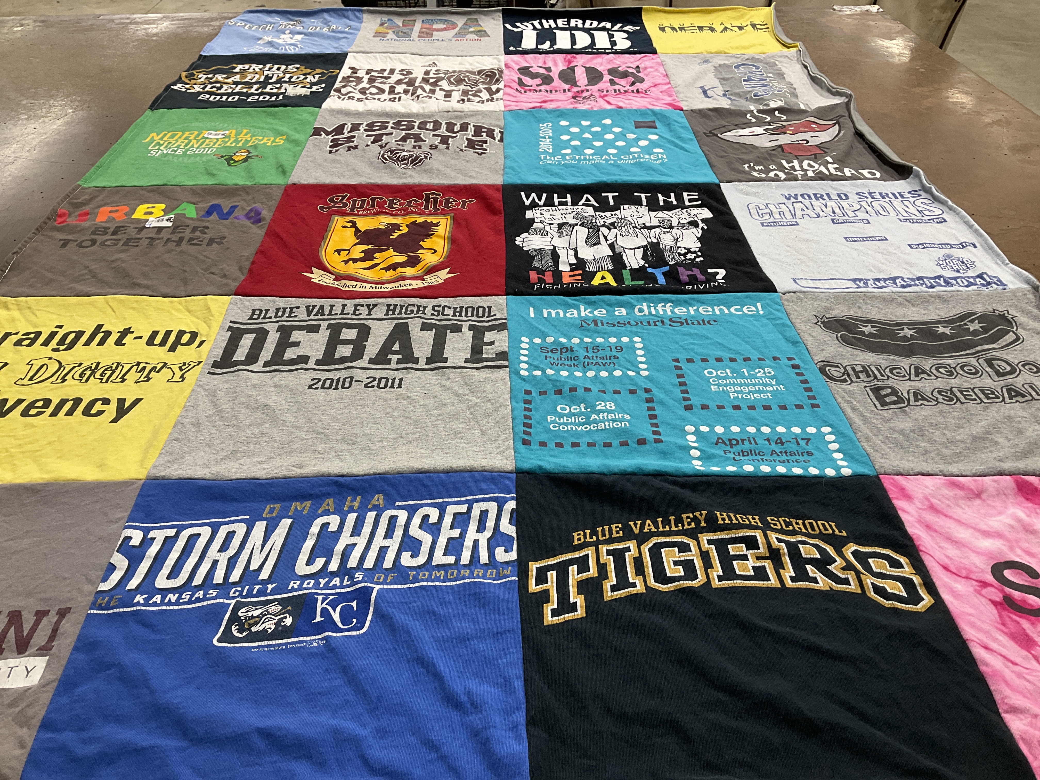 T-shirt quilt featuring omaha storm chasers, blue valley high school tigers by Samantha from MO