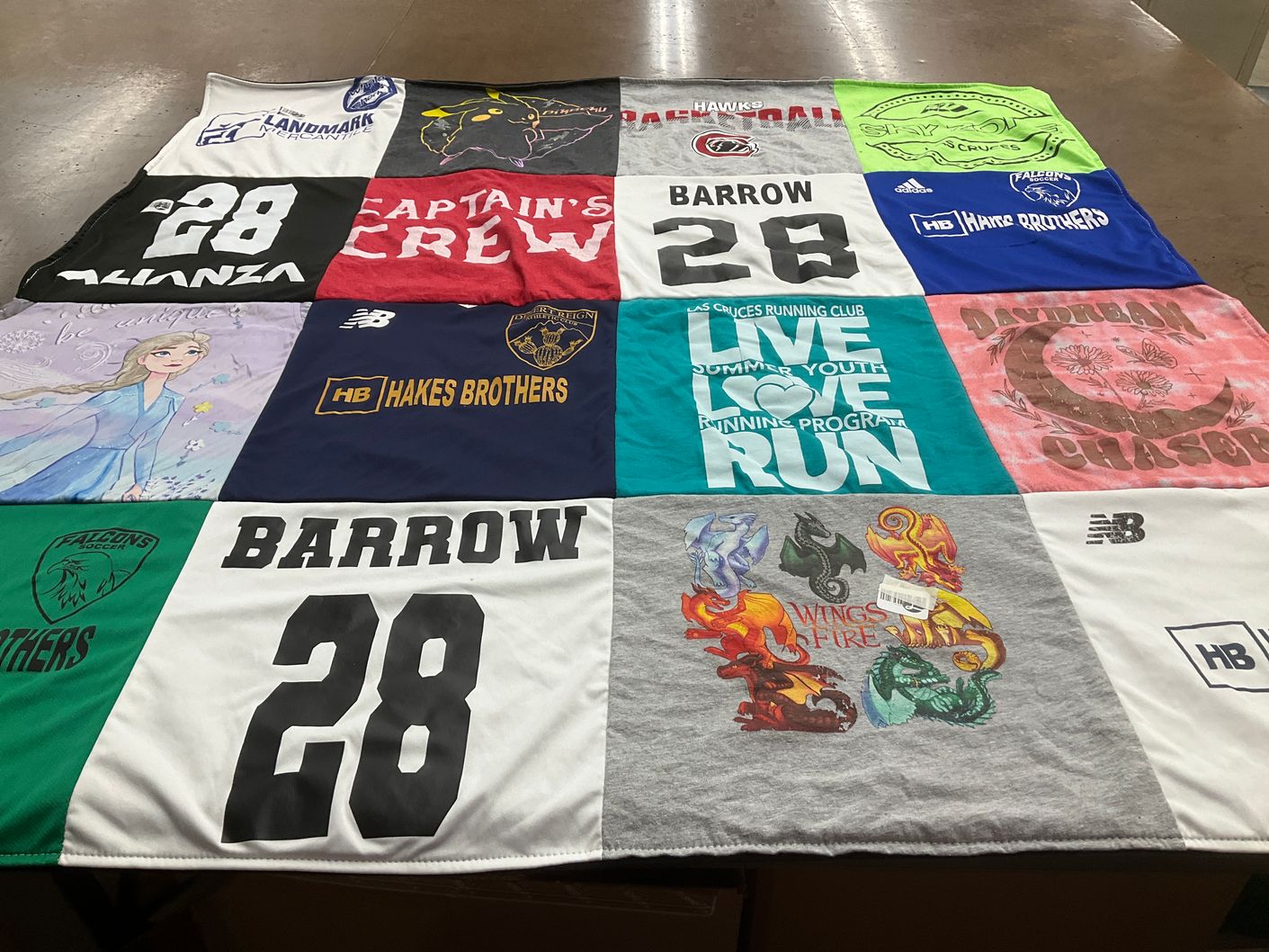T-shirt quilt with running, sports themes by Patty from NM