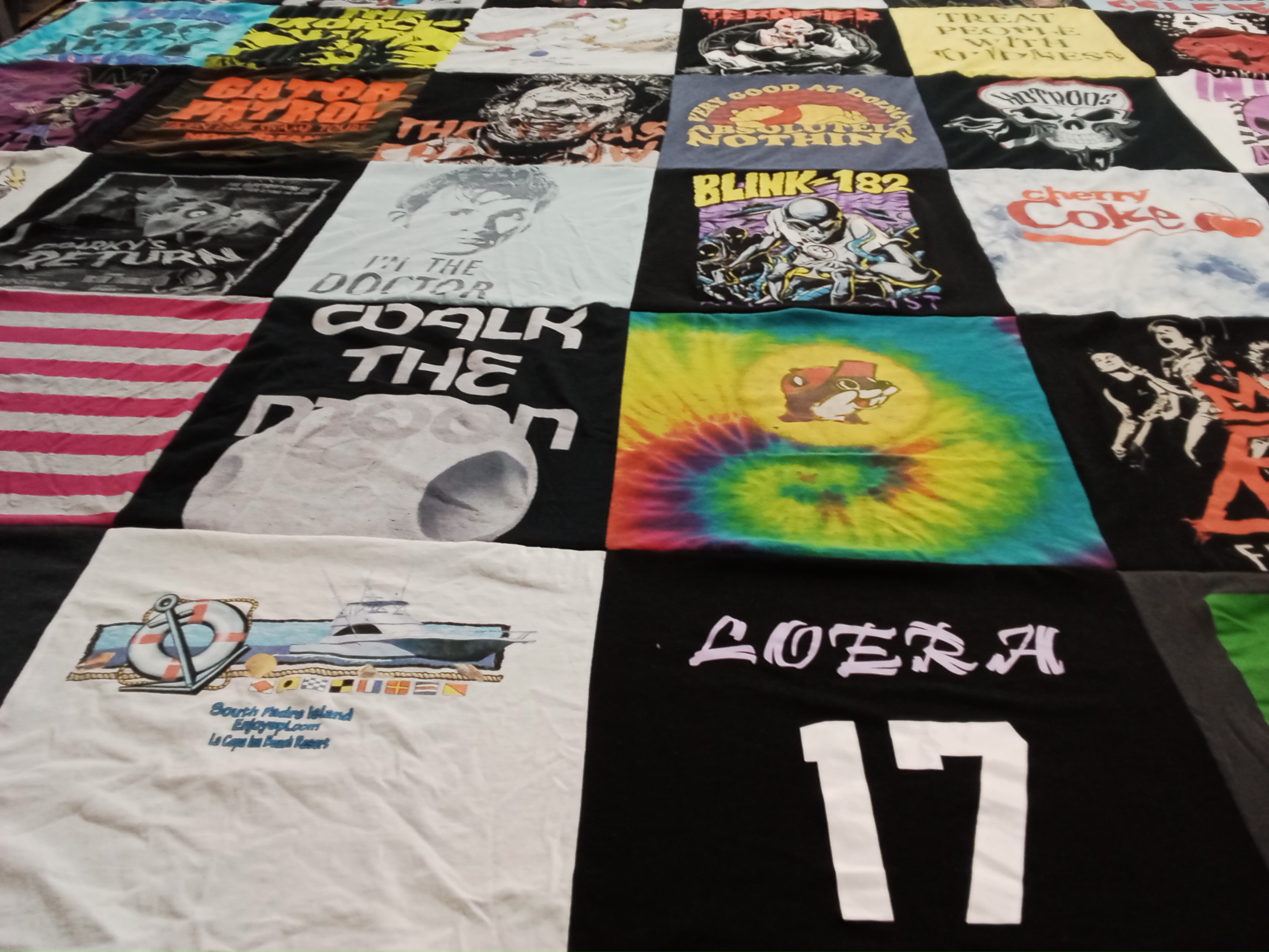 T-shirt quilt with music, pop culture themes by Rachel from TX