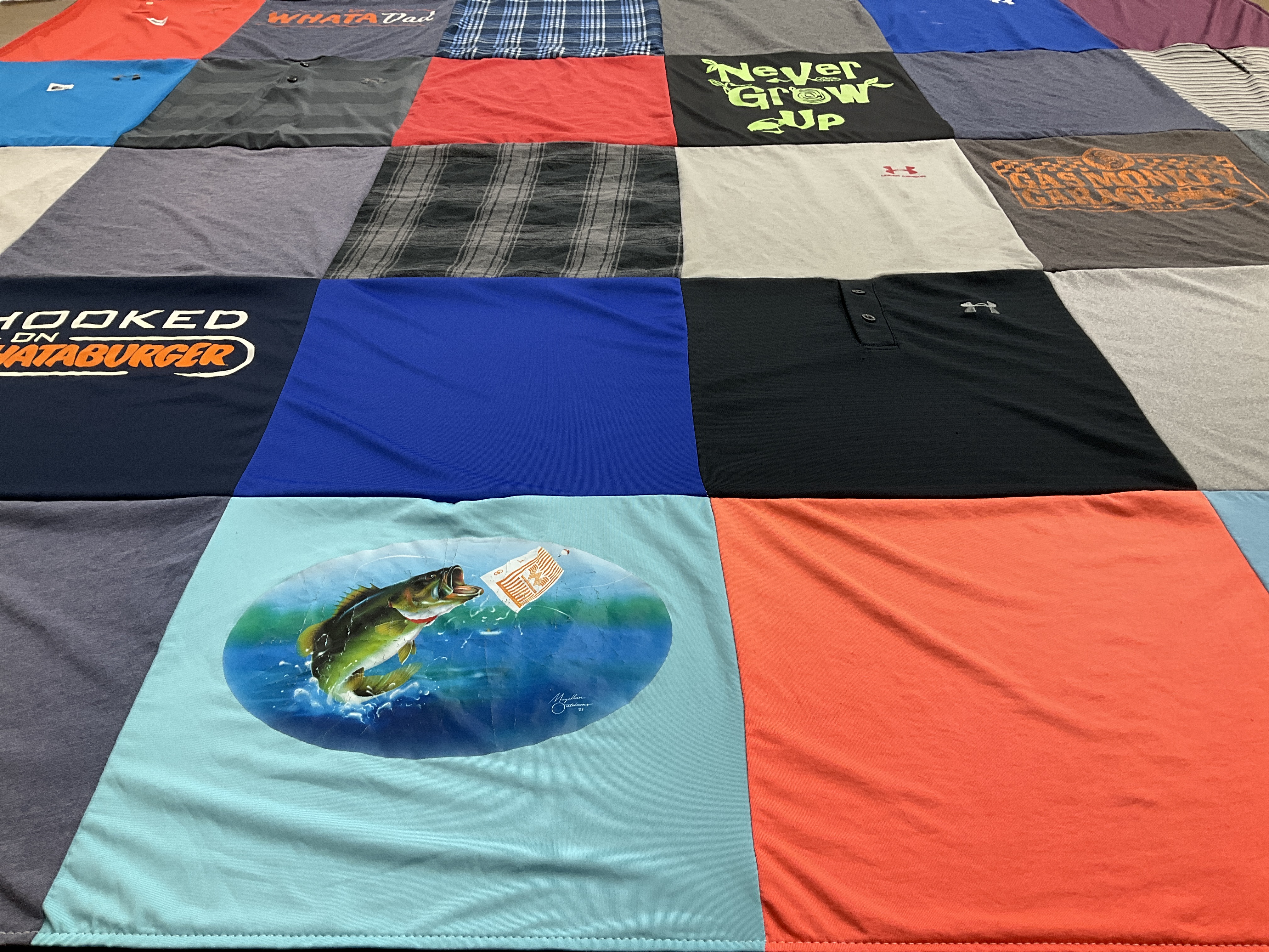 Custom Project Repat t-shirt quilt highlighting fishing, casual style themes.