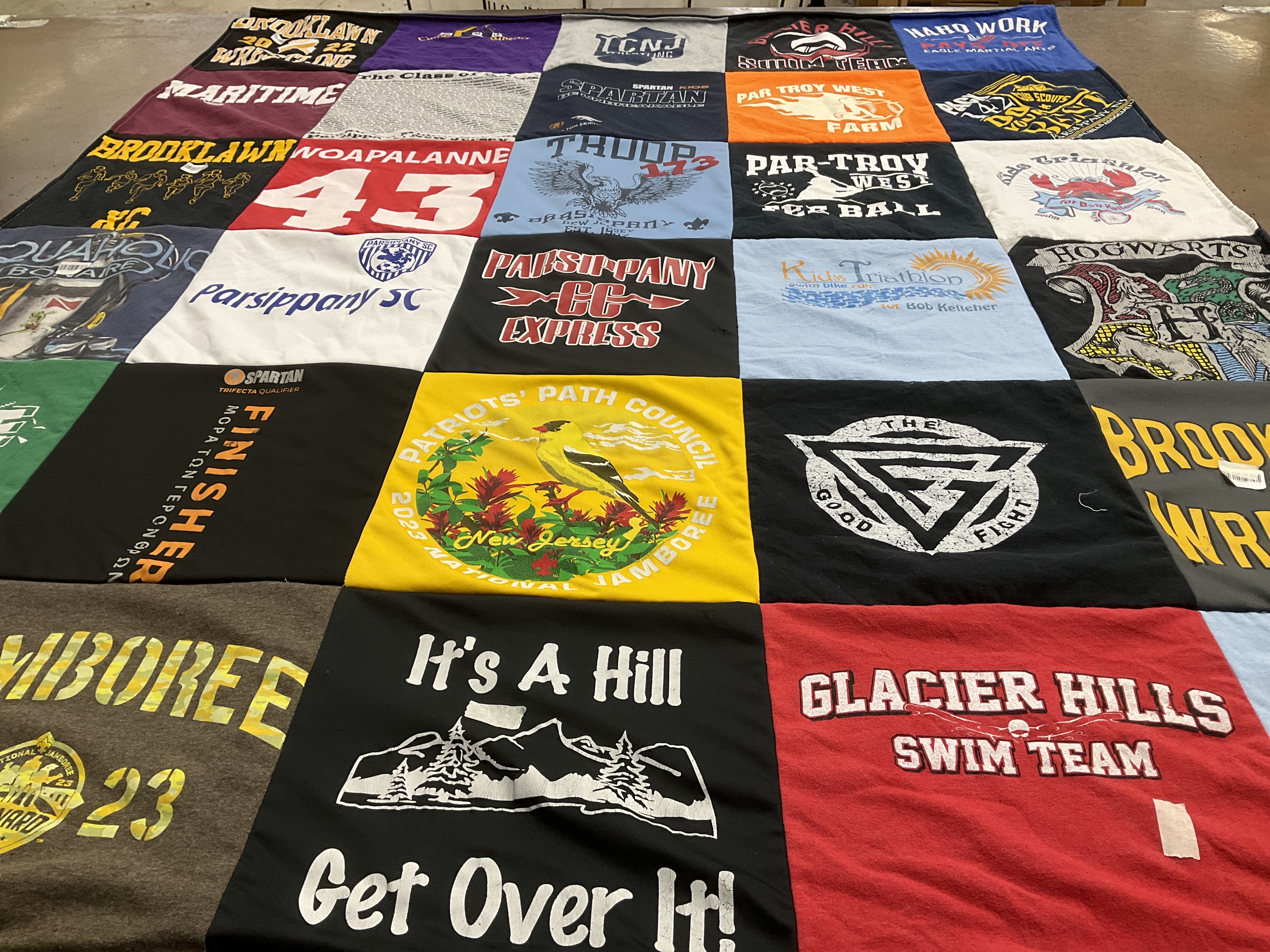 T-shirt quilt featuring glacier hills swim team by Kerry from NJ